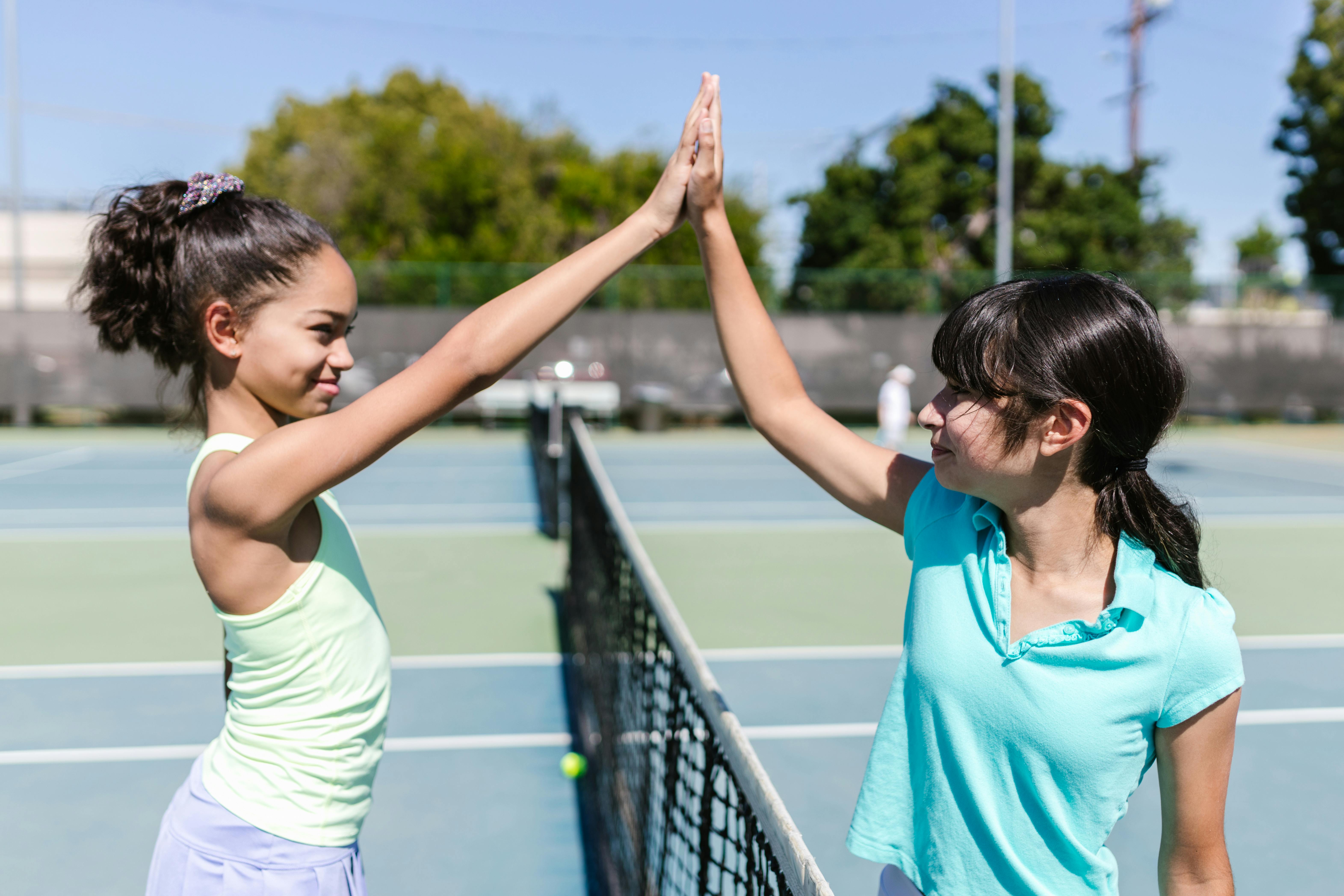 Girls Playing Tennis