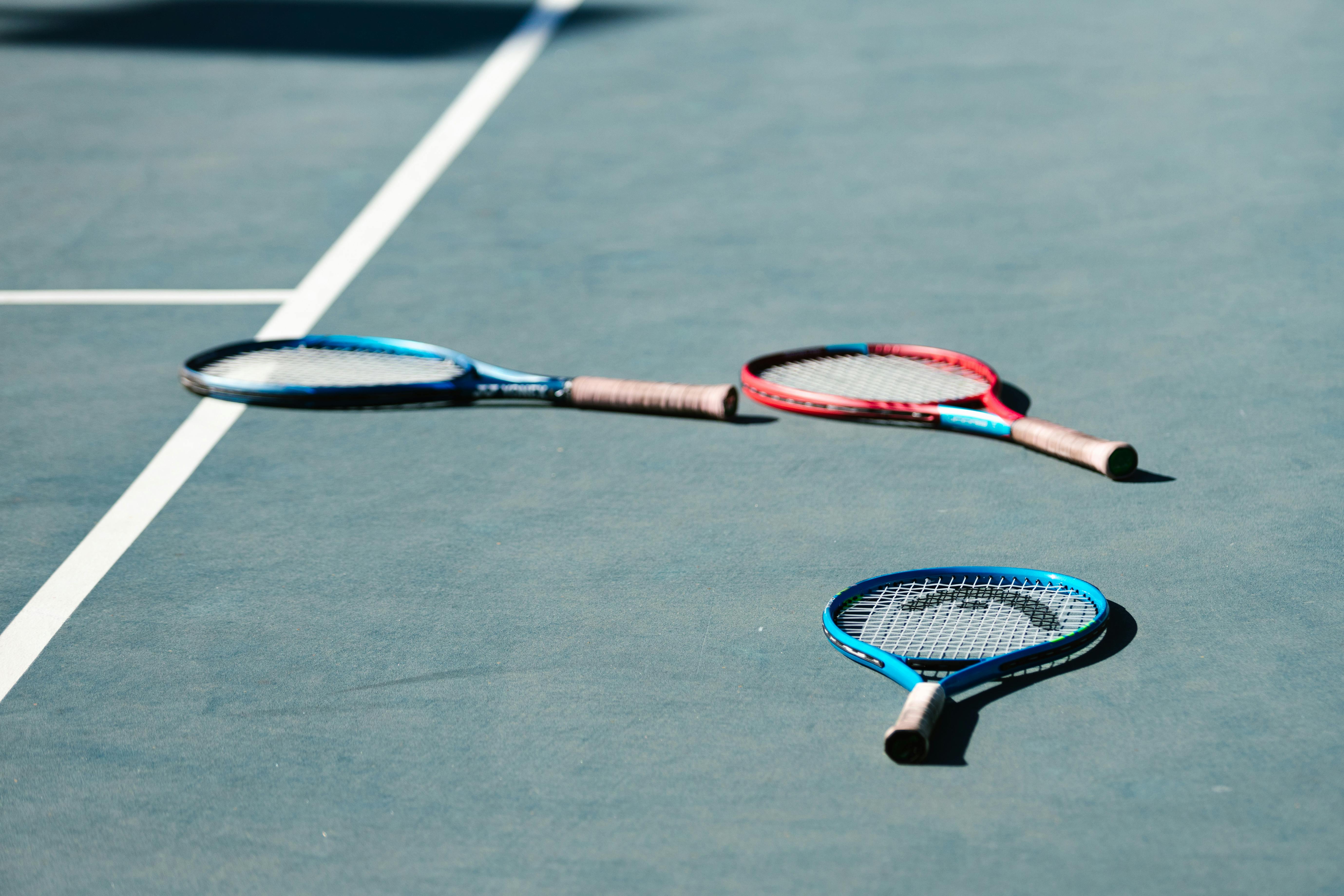 Tennis Rackets on the Floor