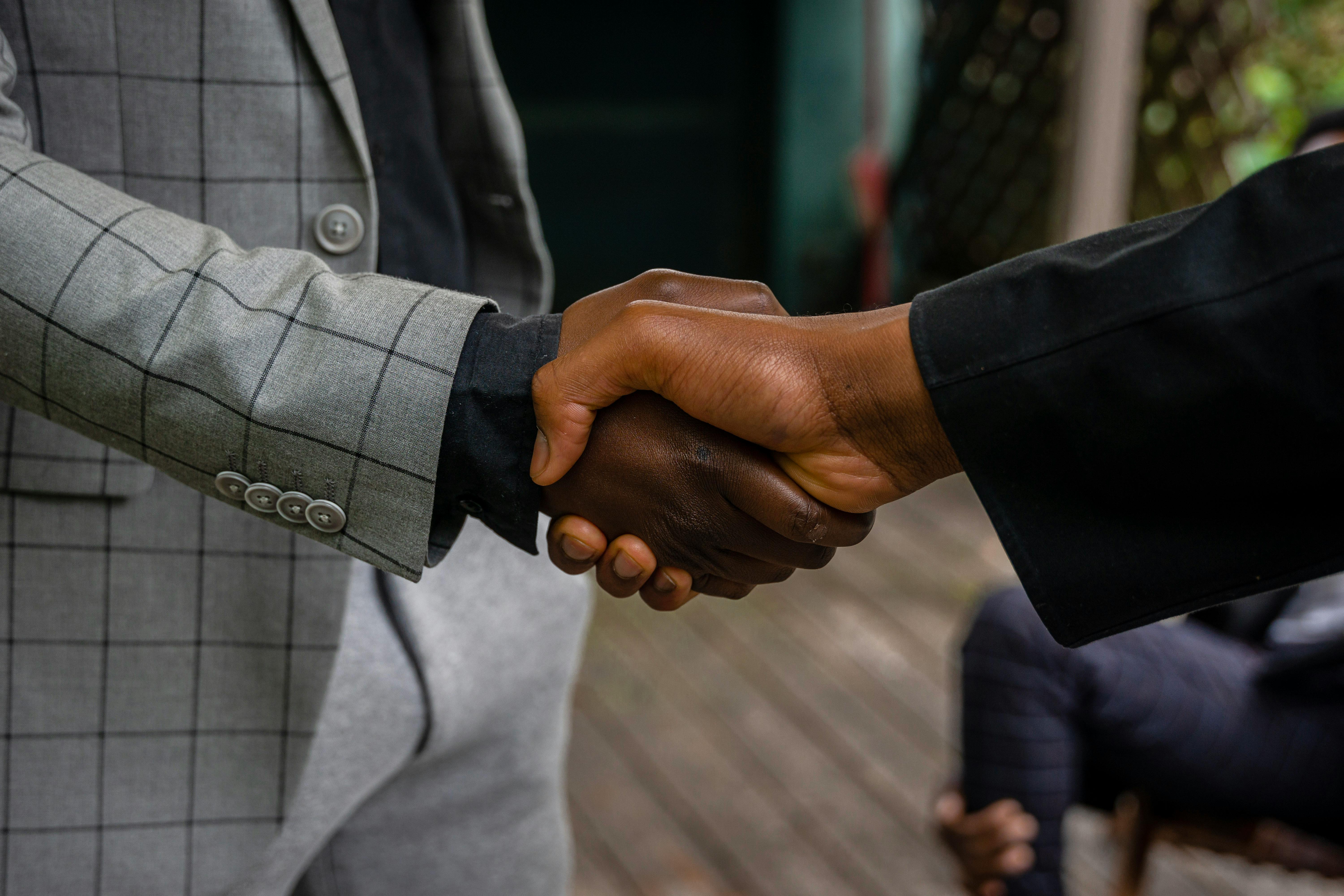 Men in Suit Jackets Shaking Hands