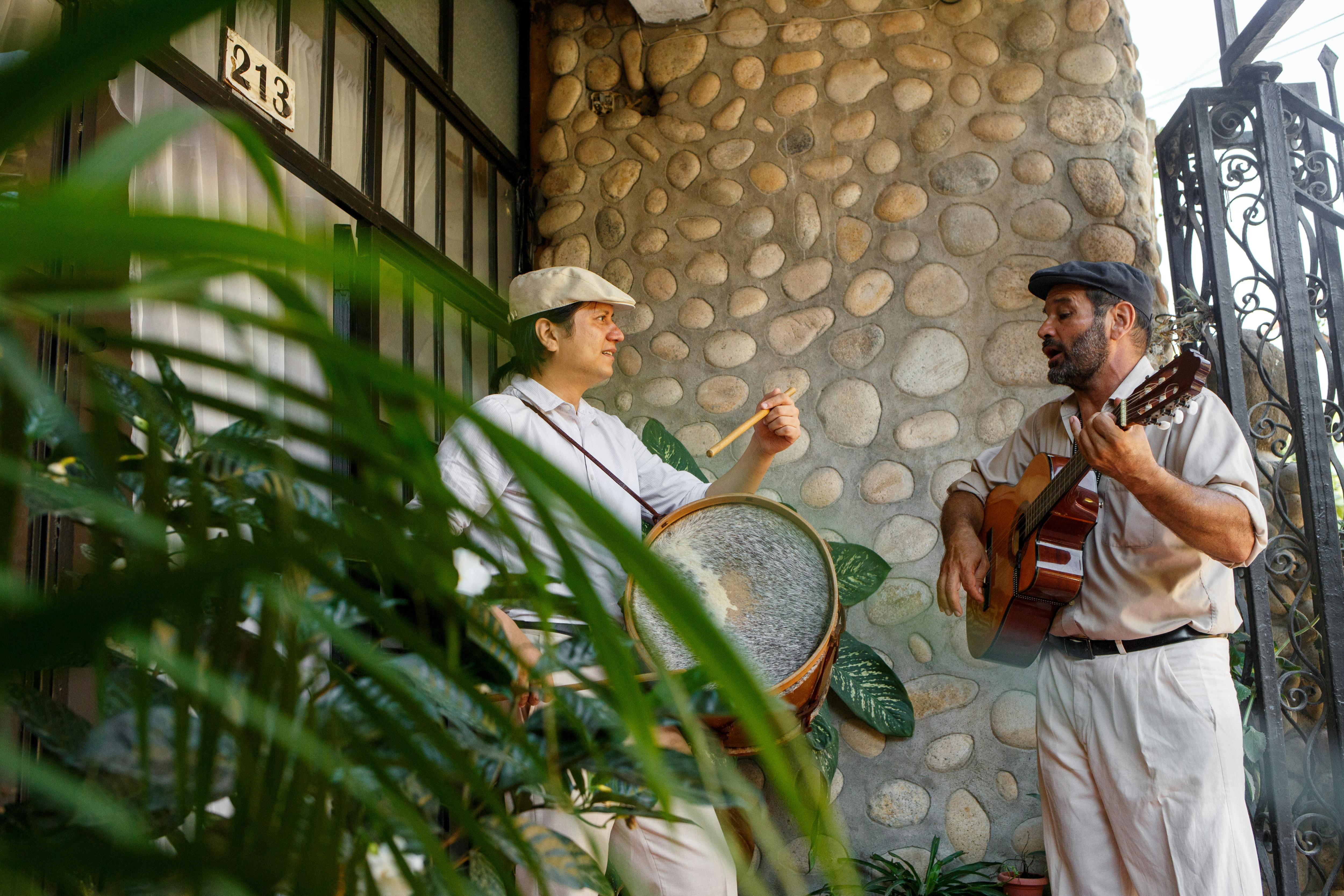 Men Holding their Musical Instruments