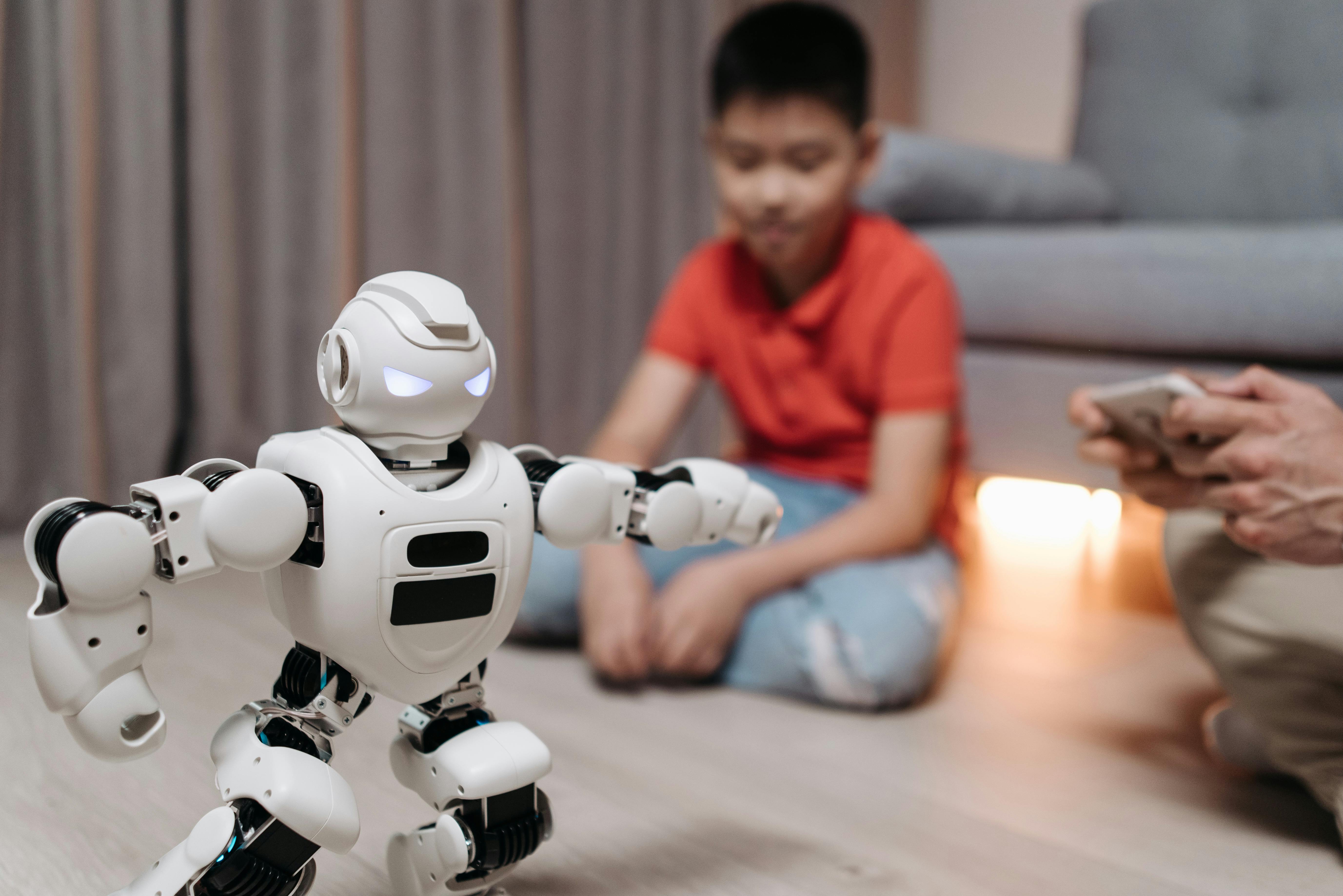 White Robot Figure on a Wooden Floor