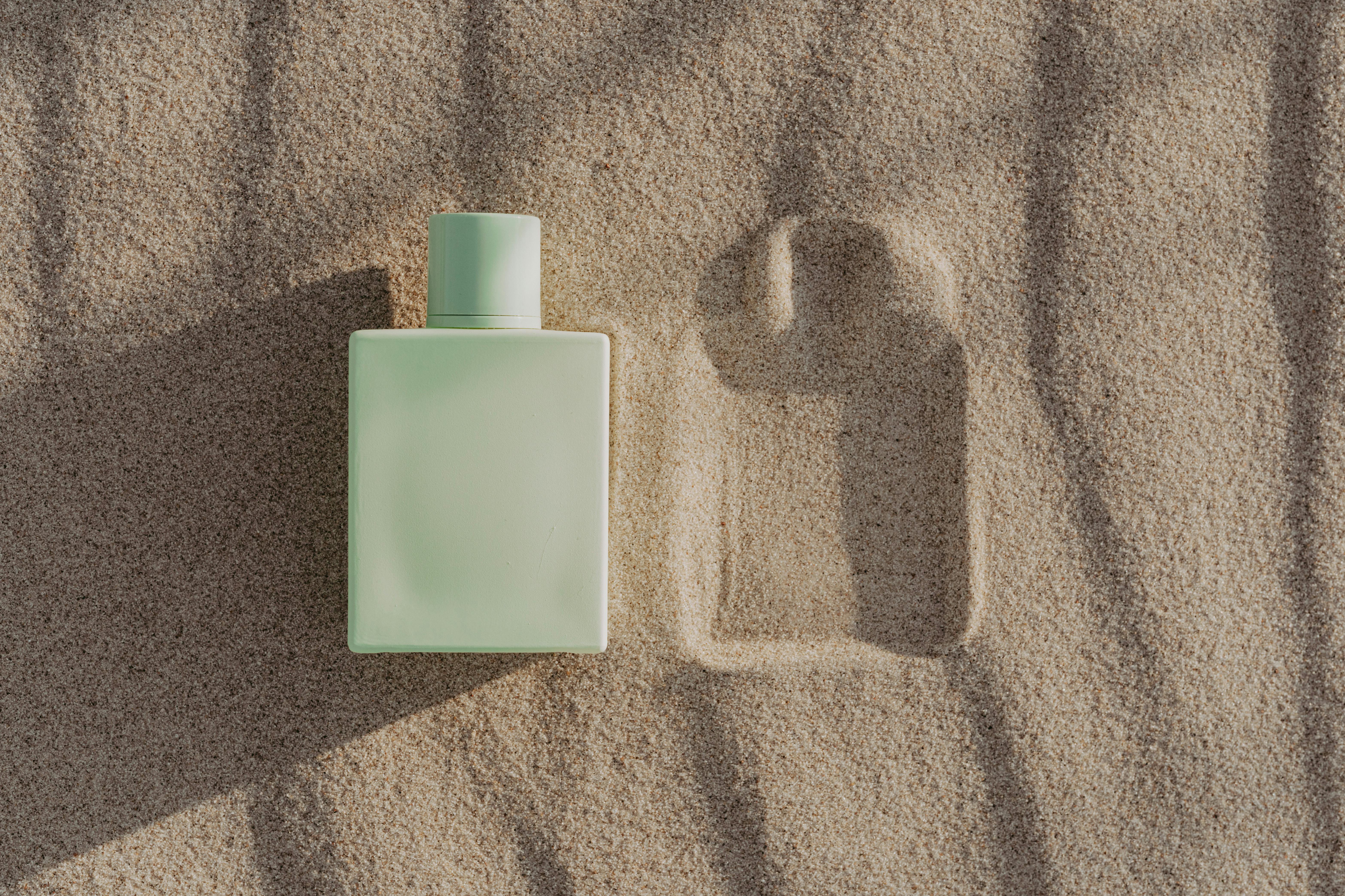 A Perfume Bottle on the Sand