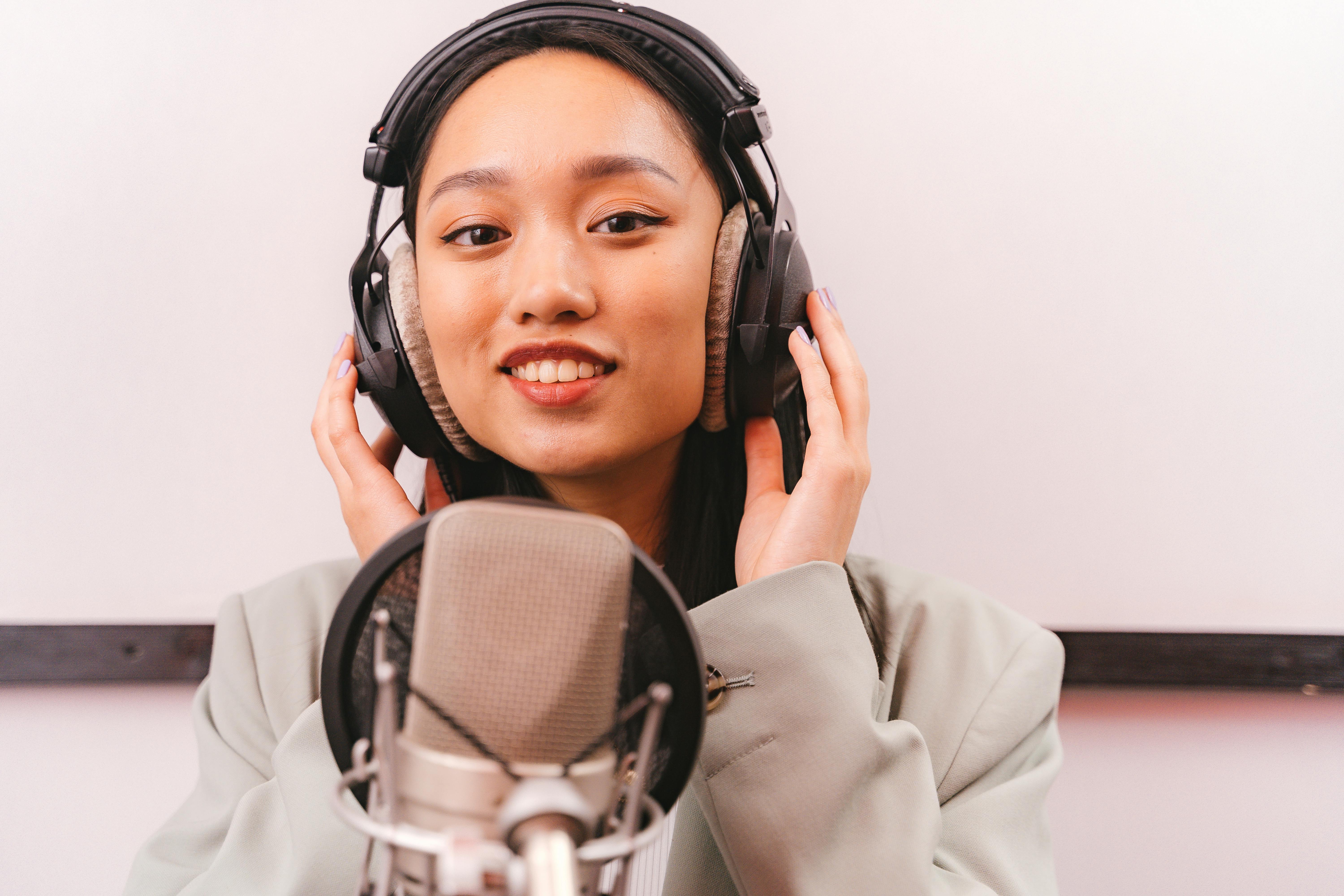 Female Artist doing a Music Recording