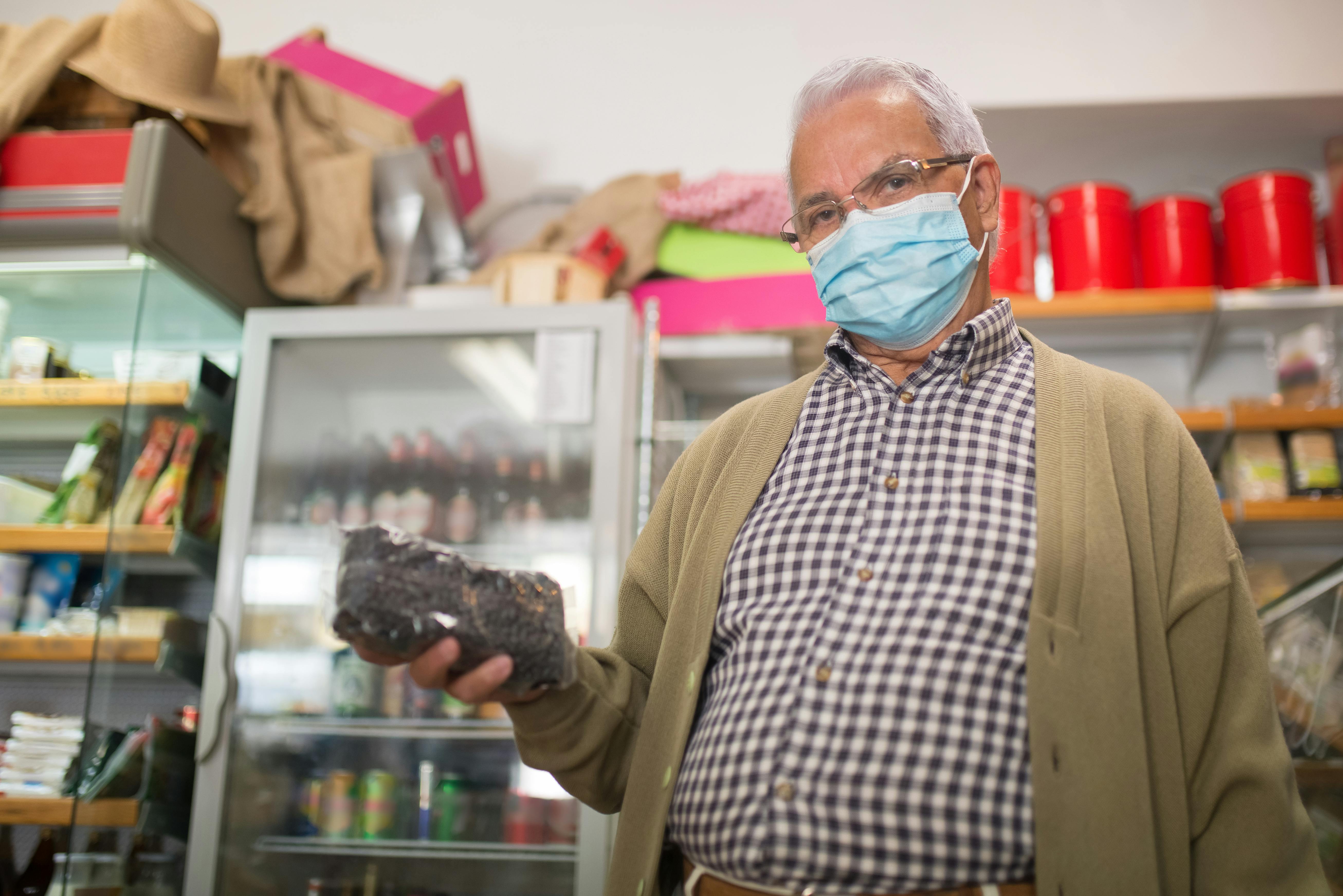 A Low Angle Shot of an Elderly Man Wearing Face Mask