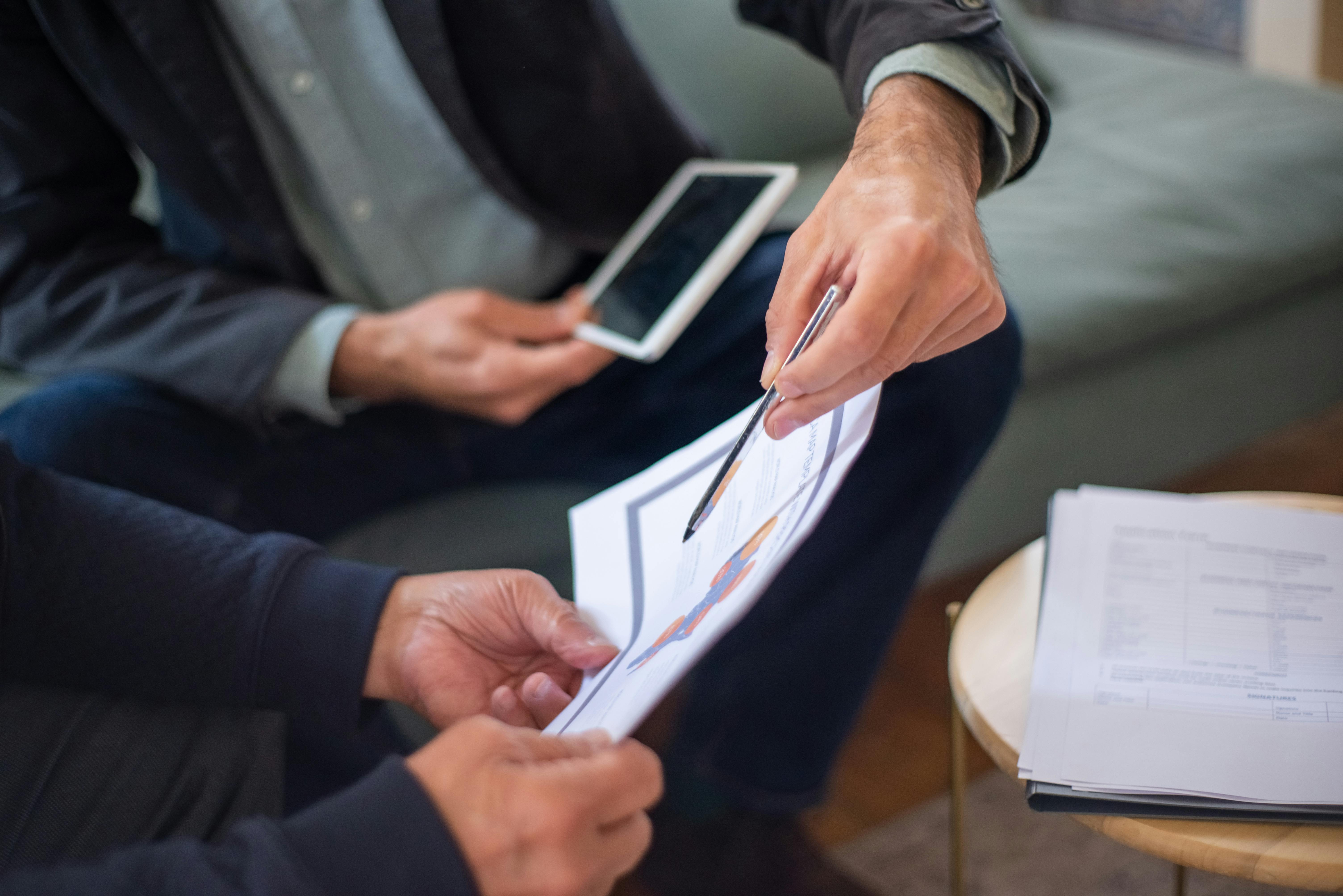 A Person Holding a Document