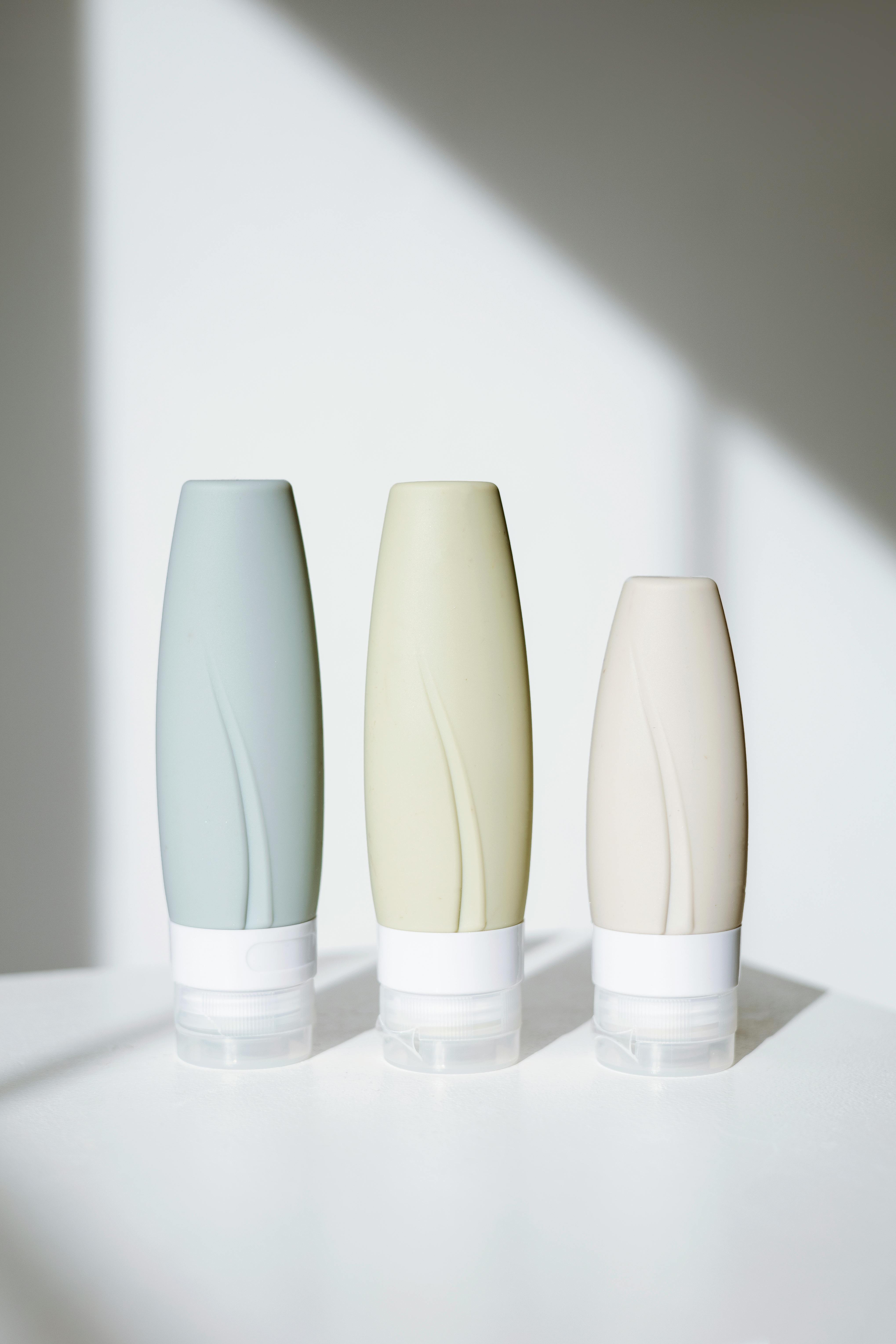 2 White Ceramic Vase on White Table