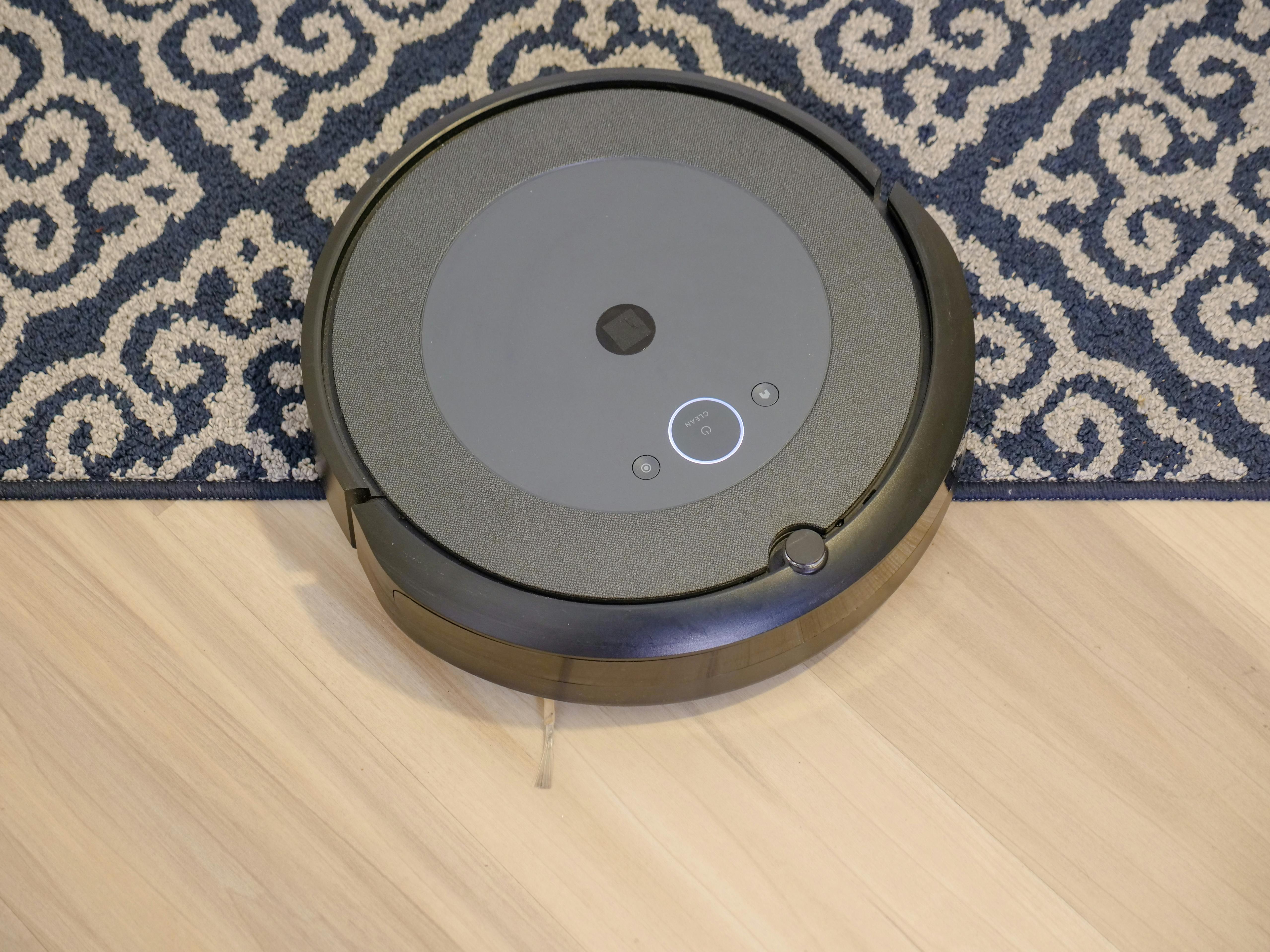 Modern Vacuum Cleaner on Wooden Flooring