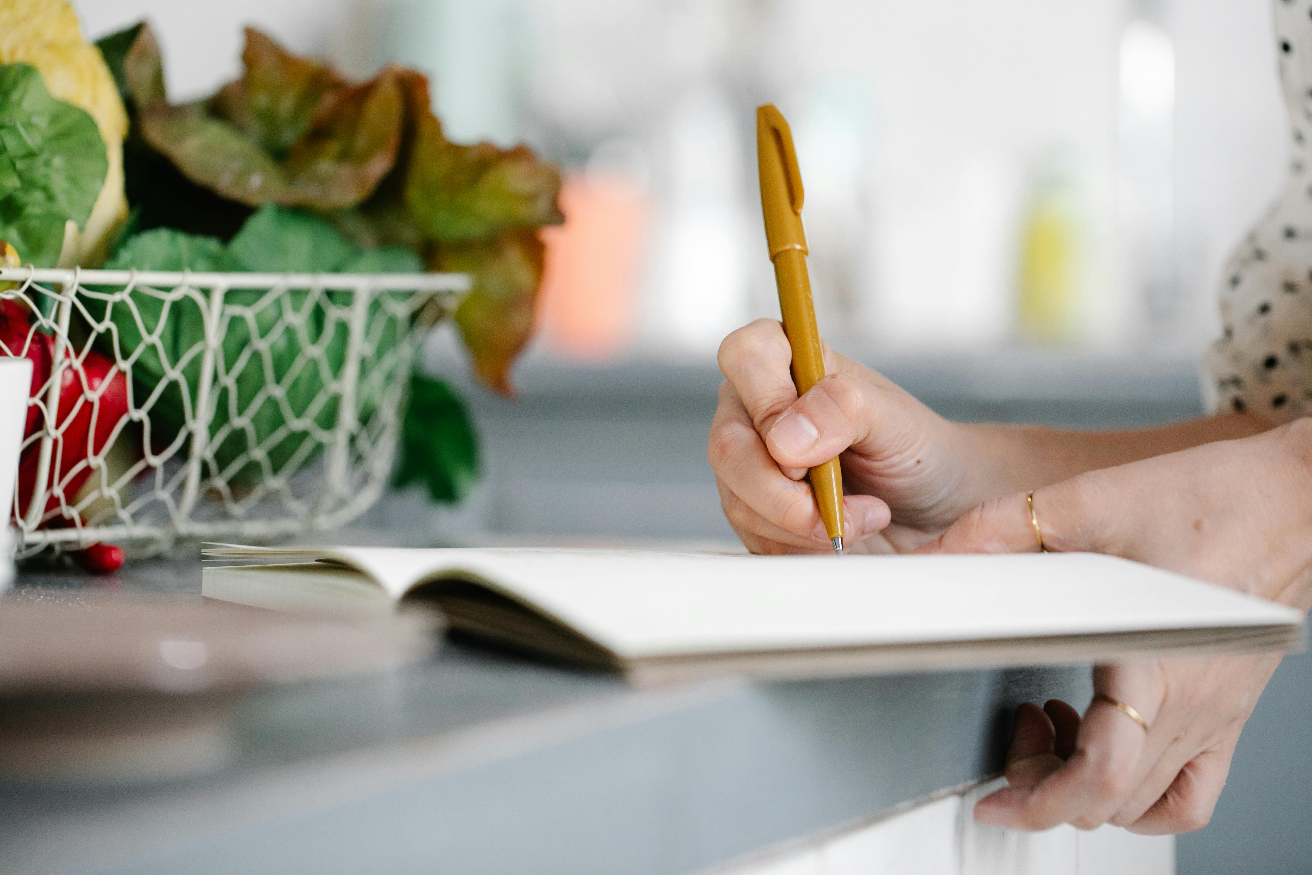 Close-up of Writing on a Notebook