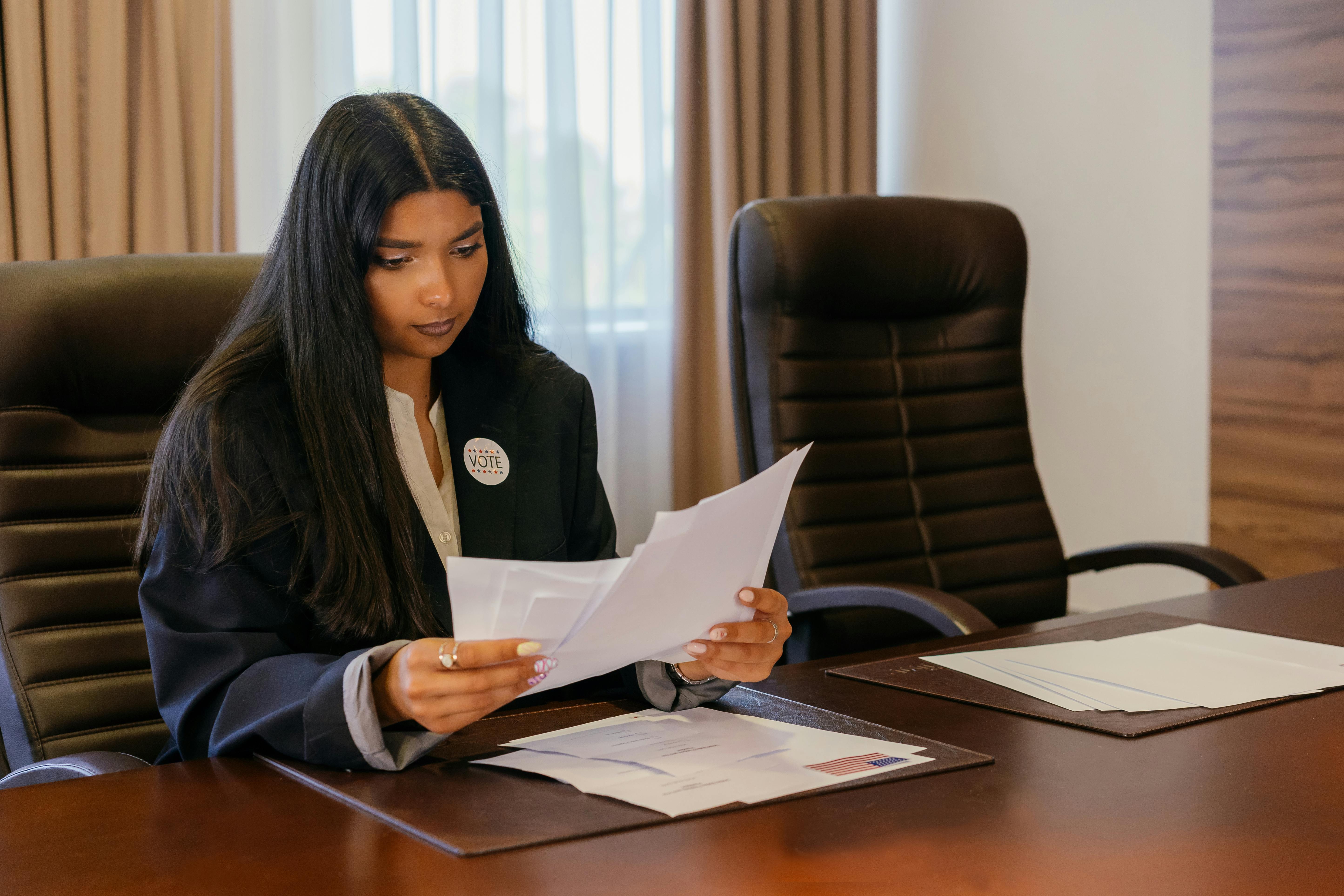 Professional Woman Looking at Documents