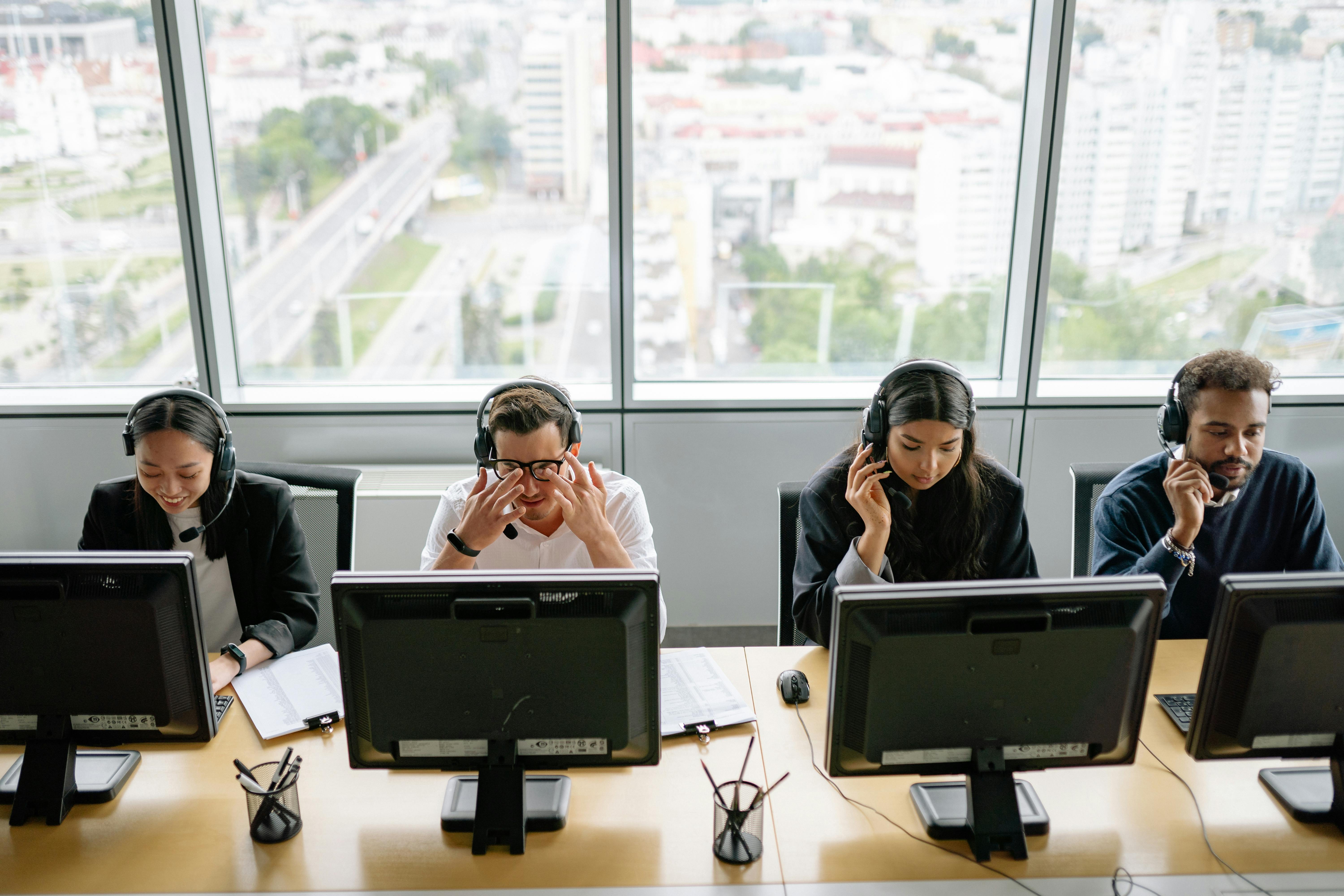 People Sitting in Front of Computers