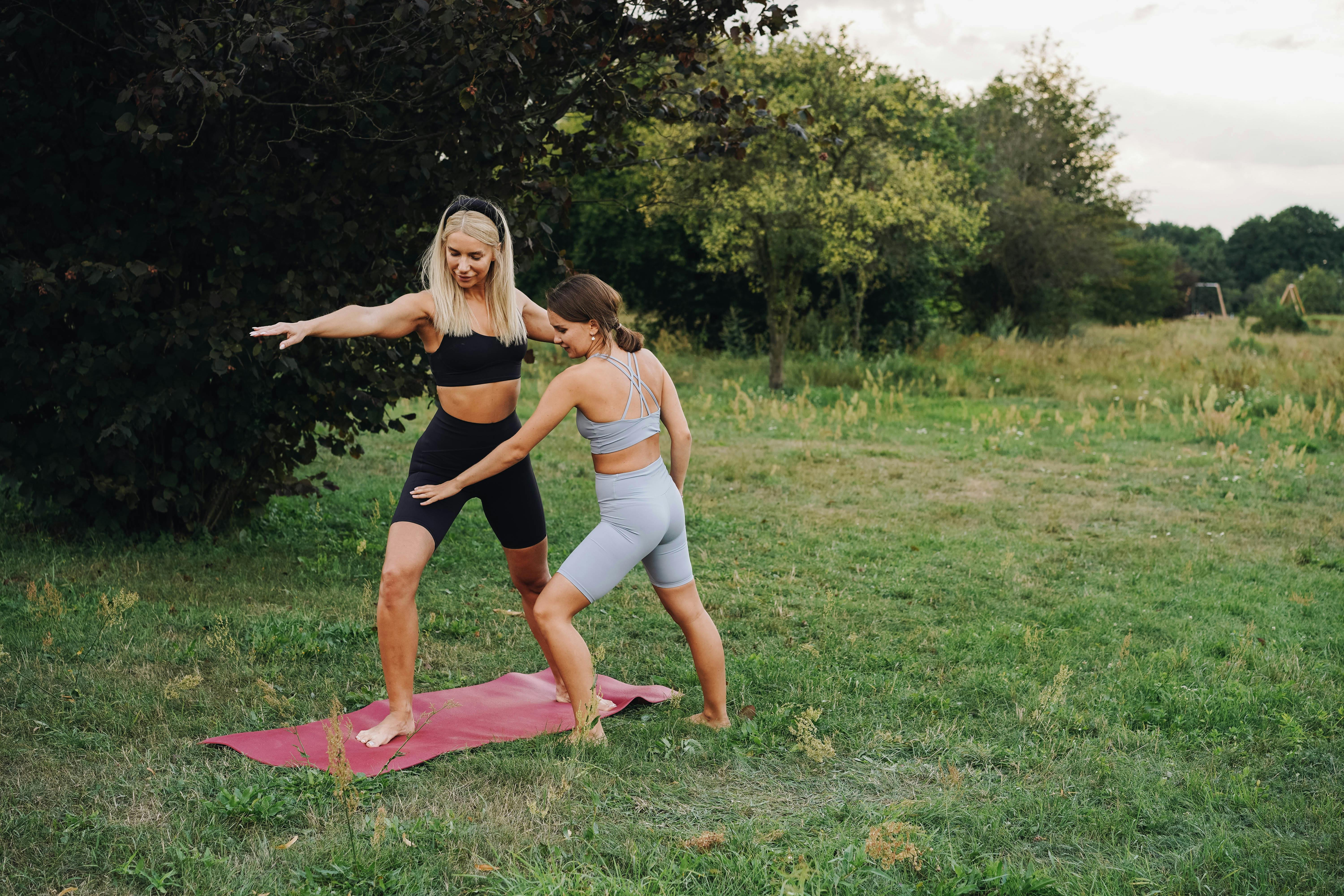 A Two Women Doing Exercise Together