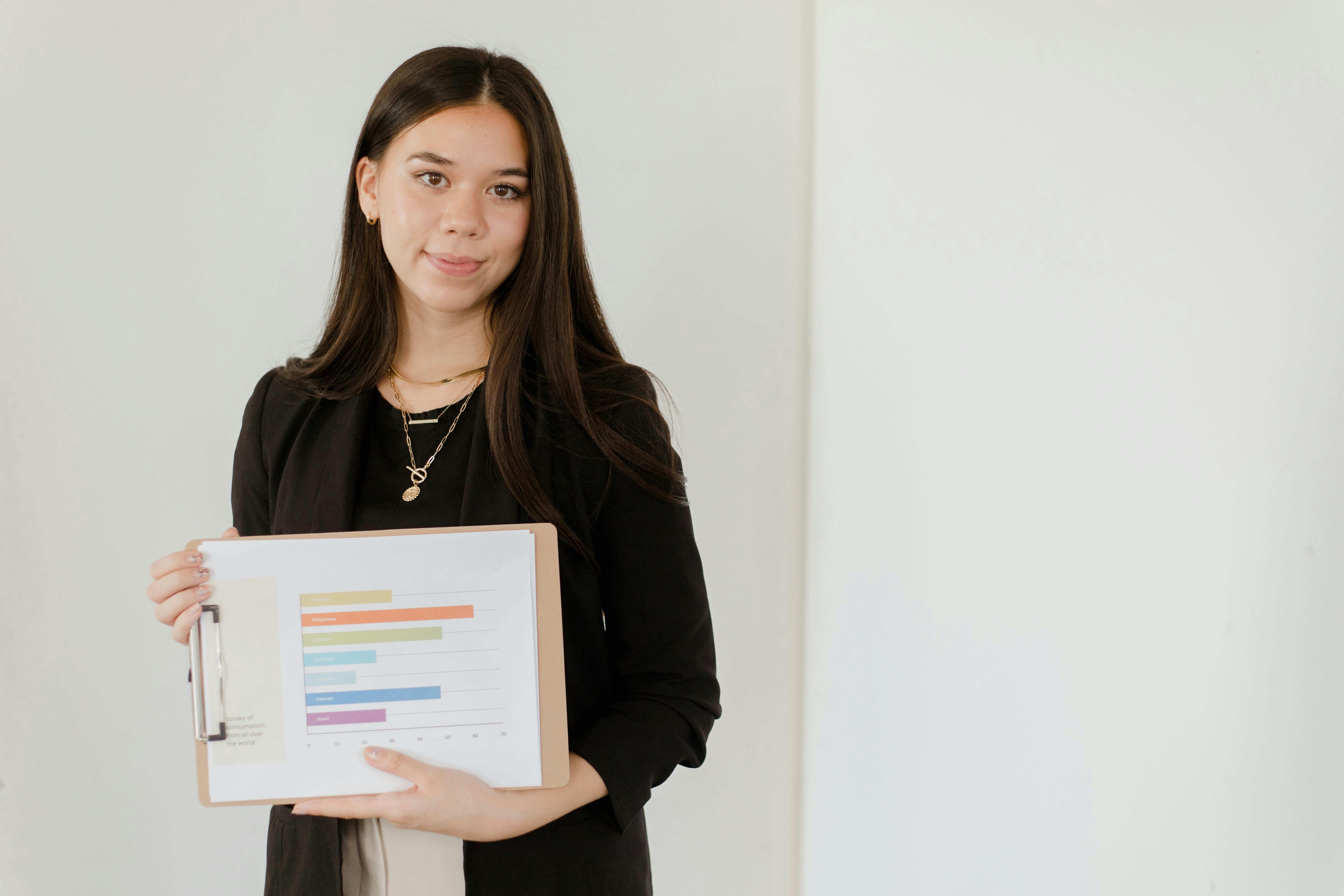 Woman Holding a Clipboard