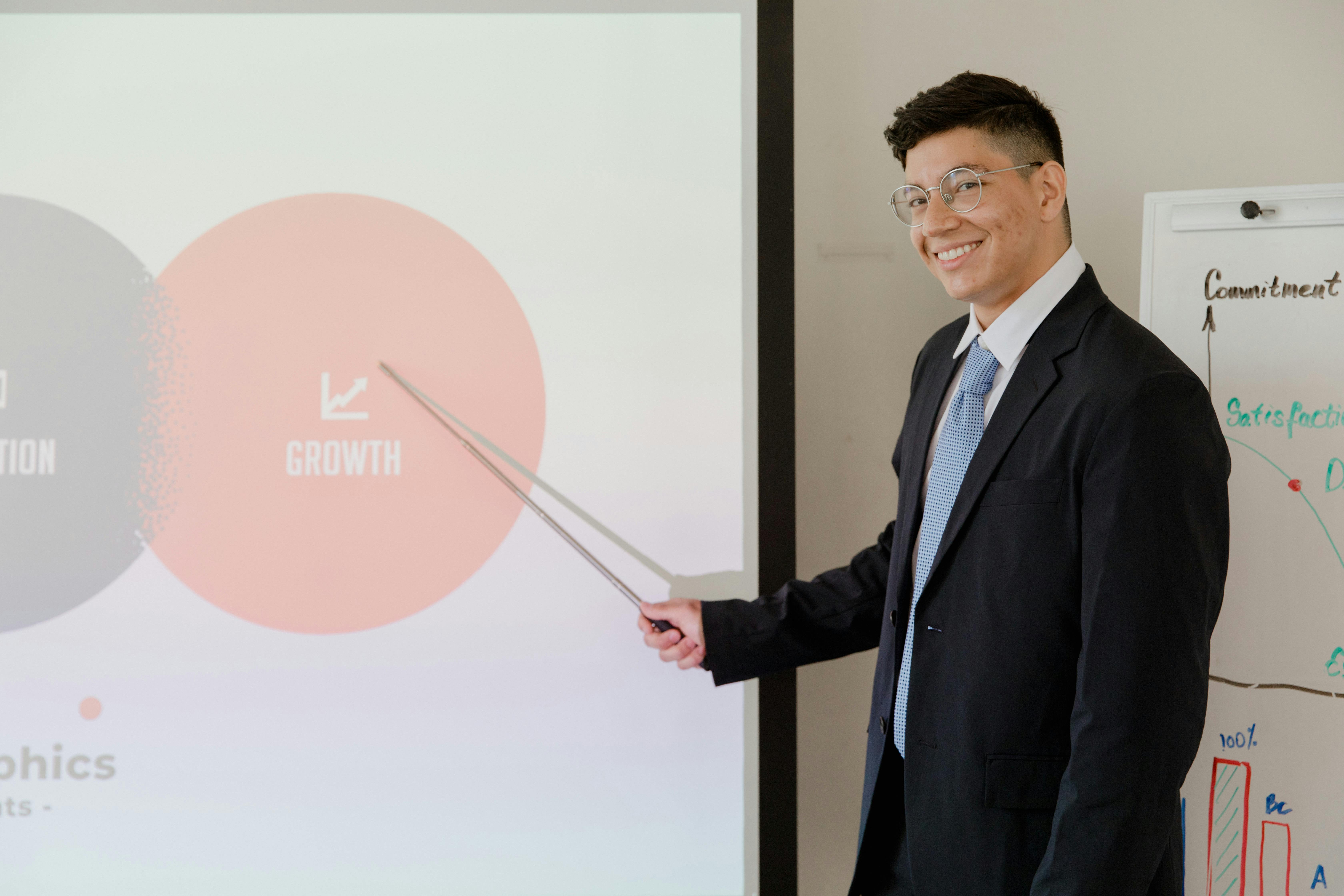 Smiling Businessman Discussing His Presentation