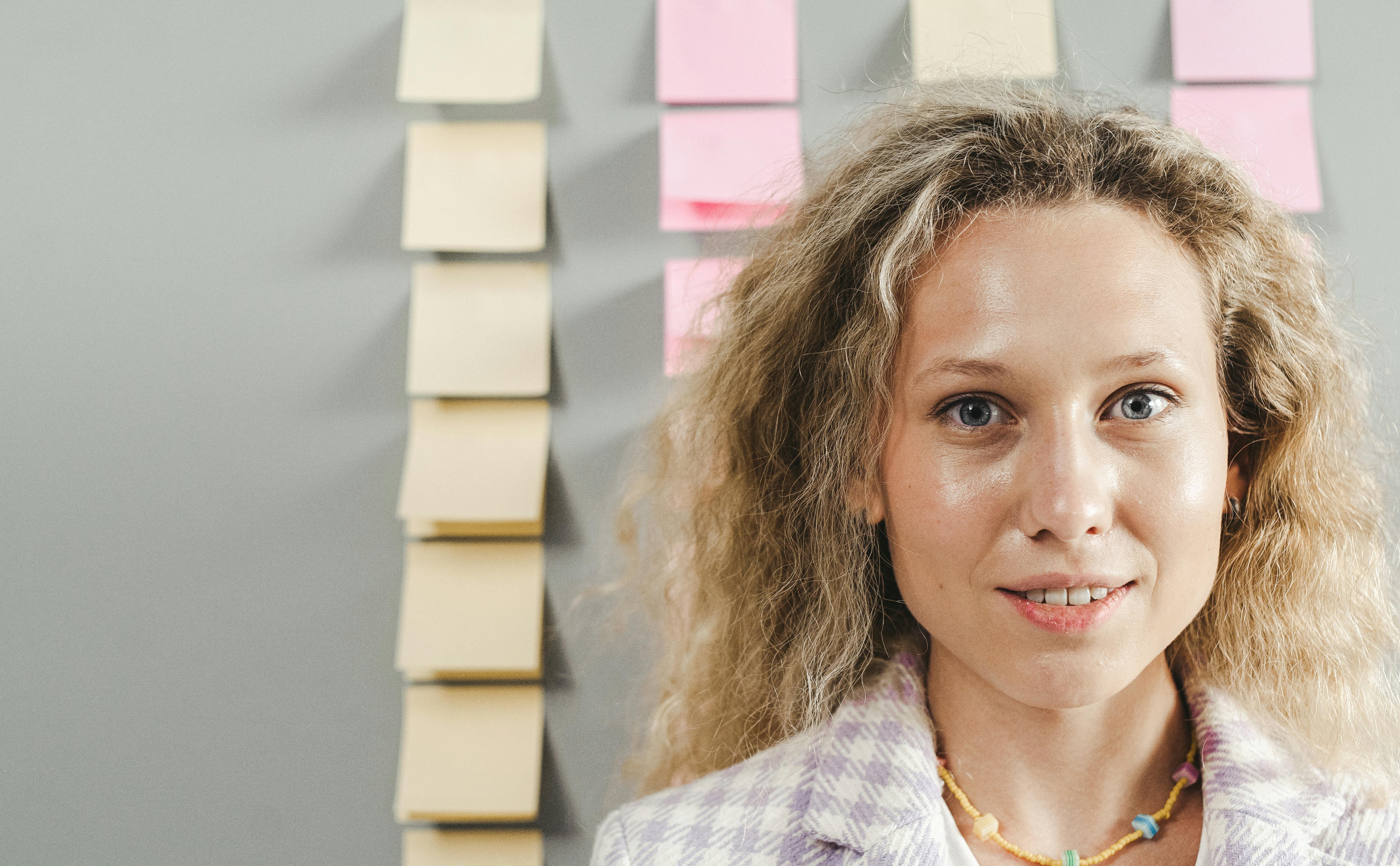 Portrait of Blonde Woman with Curly Hair