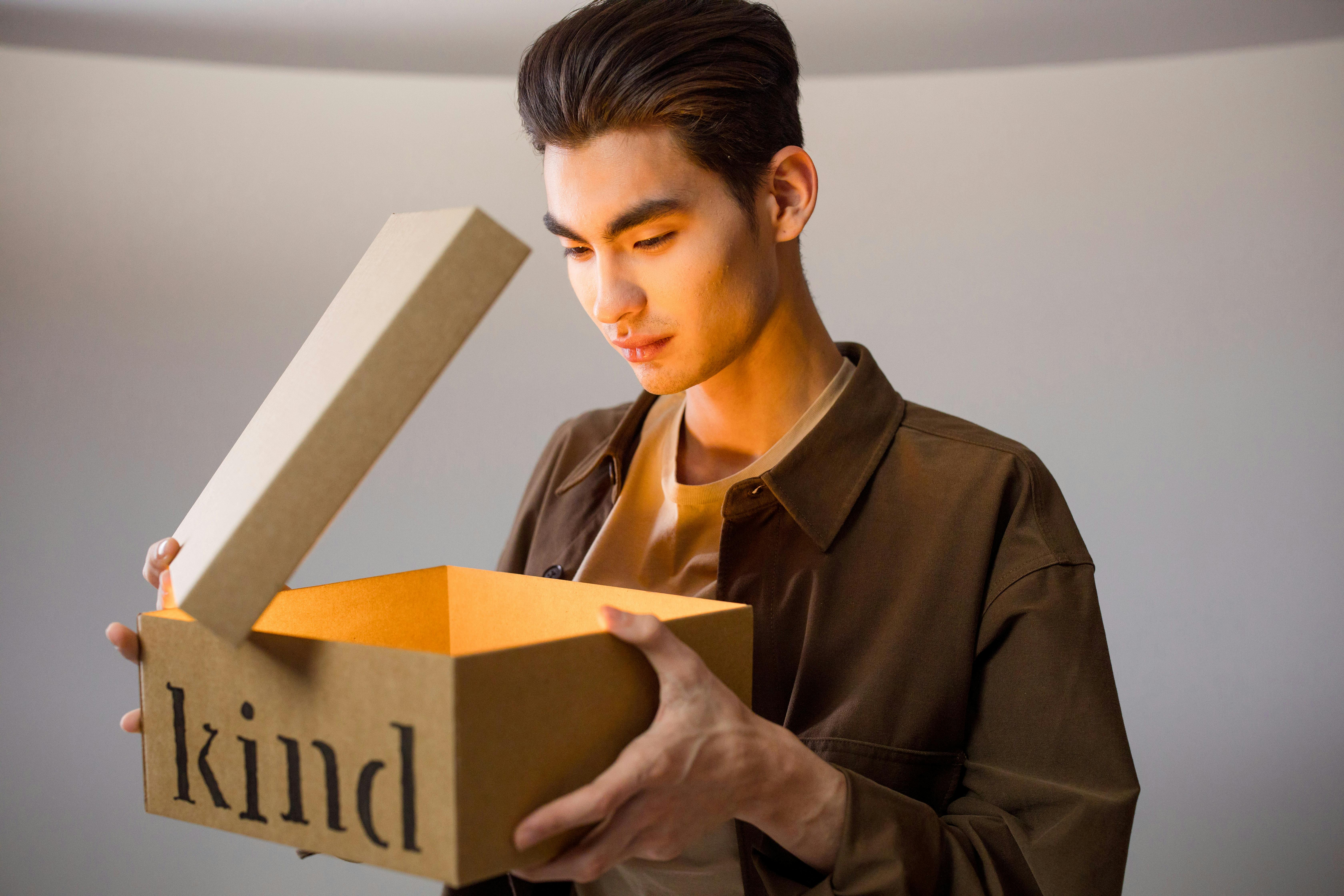 A Man Looking at the Box