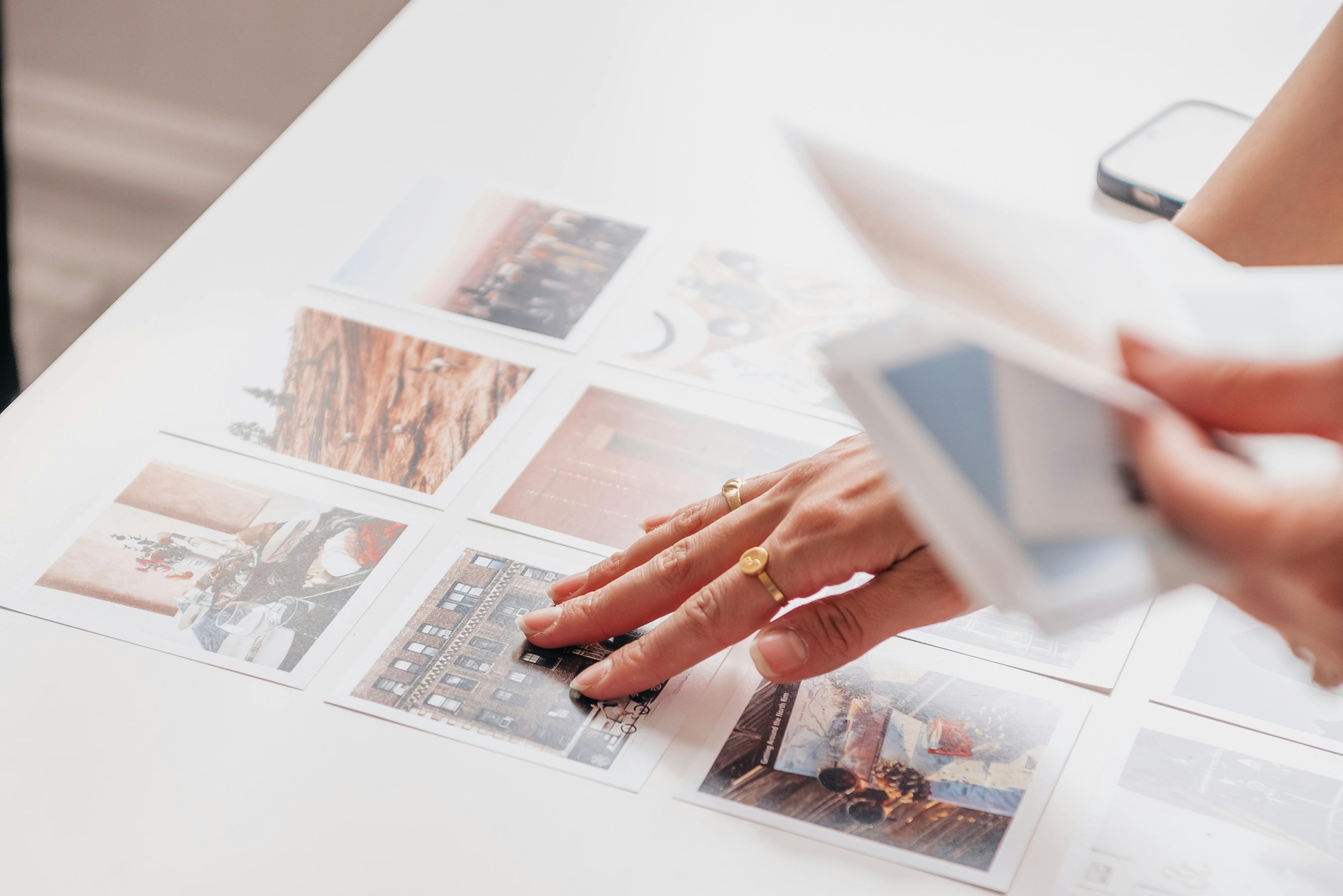 Woman Hands Placing Pictures