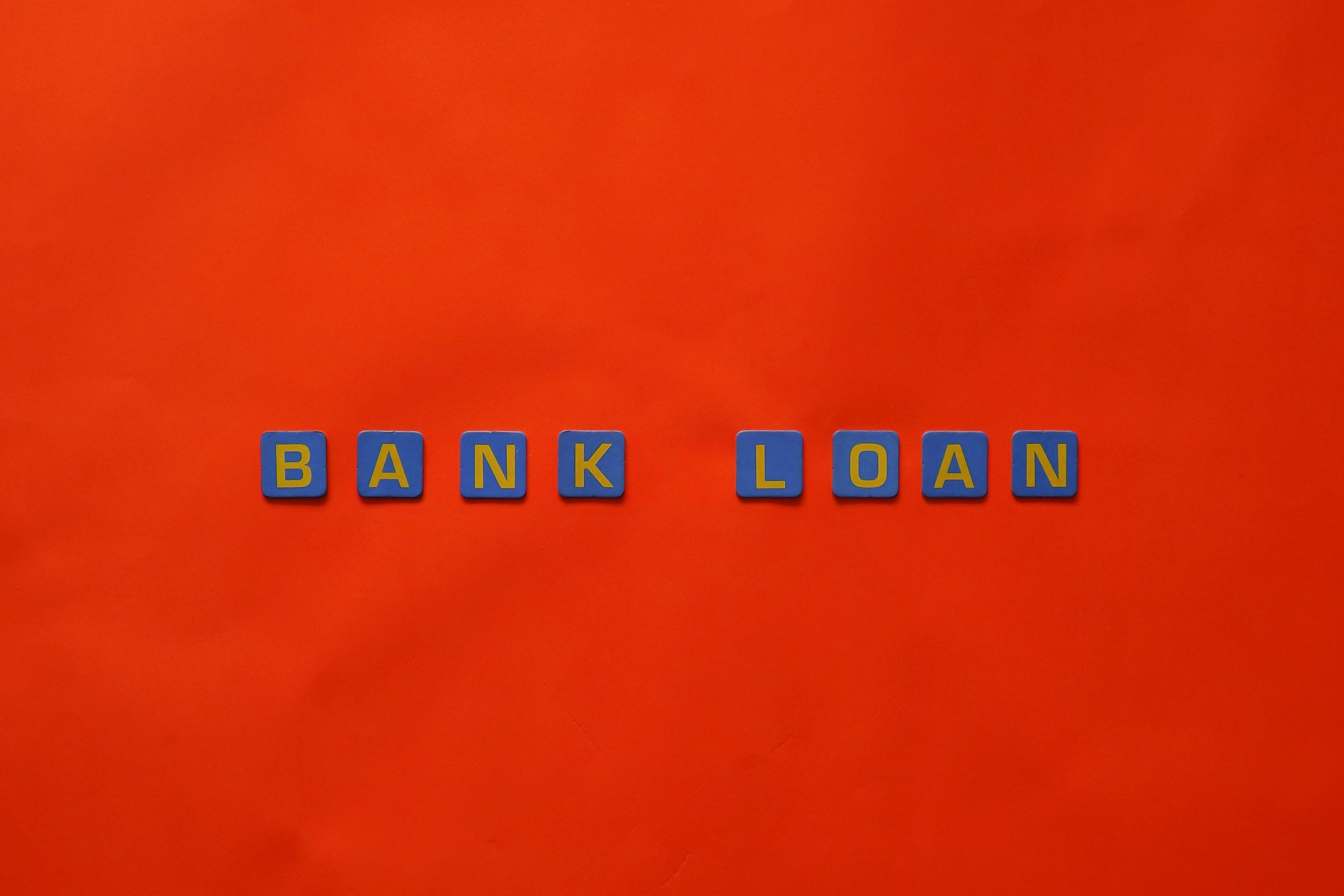 Close-Up Shot of Text on a Red Surface