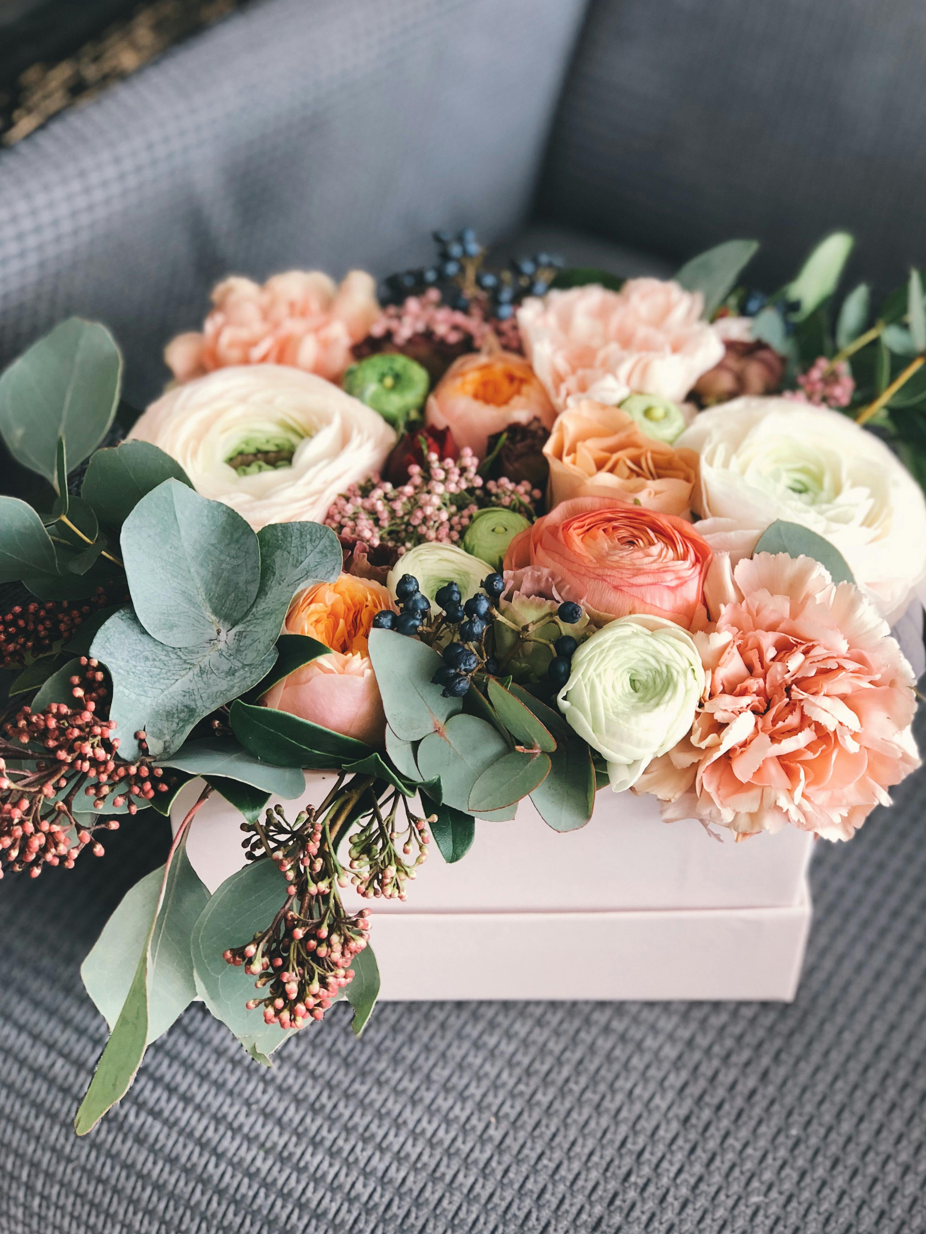 White, Orange, and Green Floral Bouquet Decor