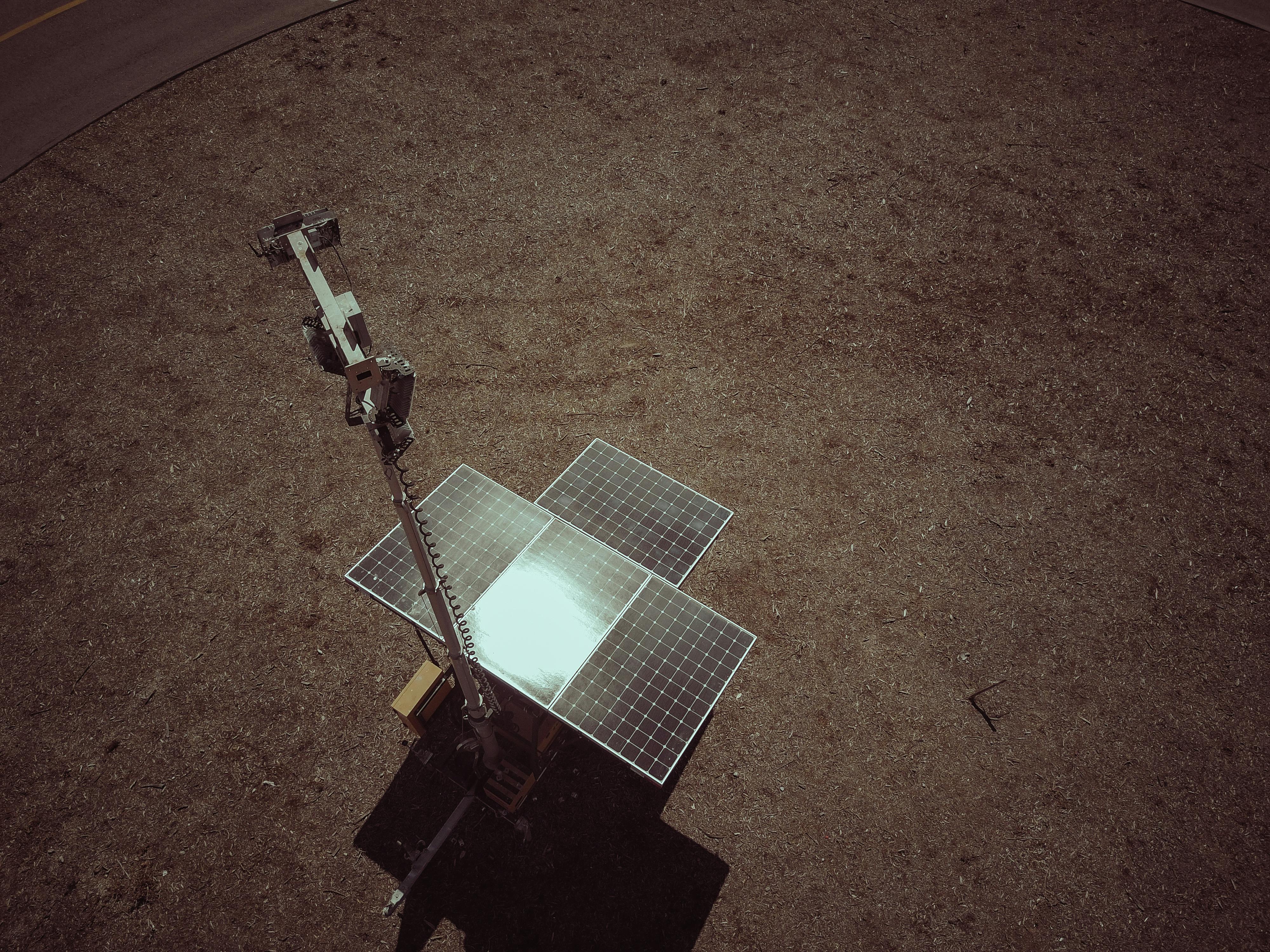 Drone Shot of Solar Panels on Grass