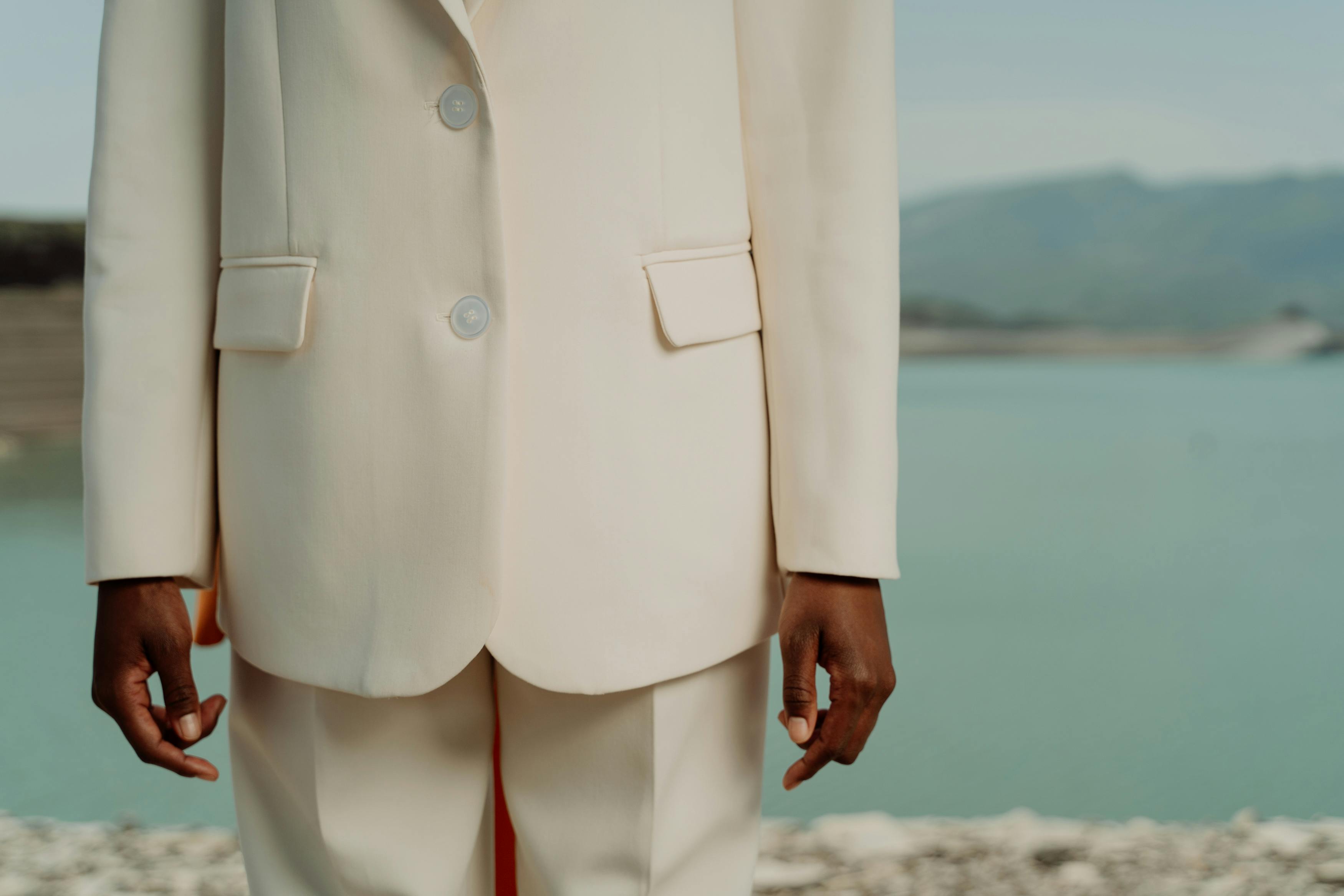 A Person in White Suit and White Pants