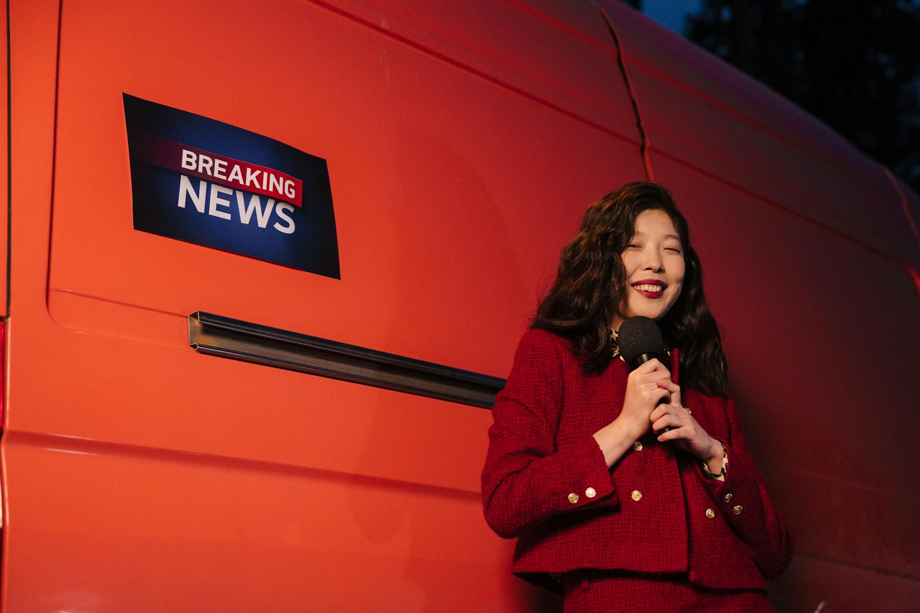 Woman Standing Beside a Van