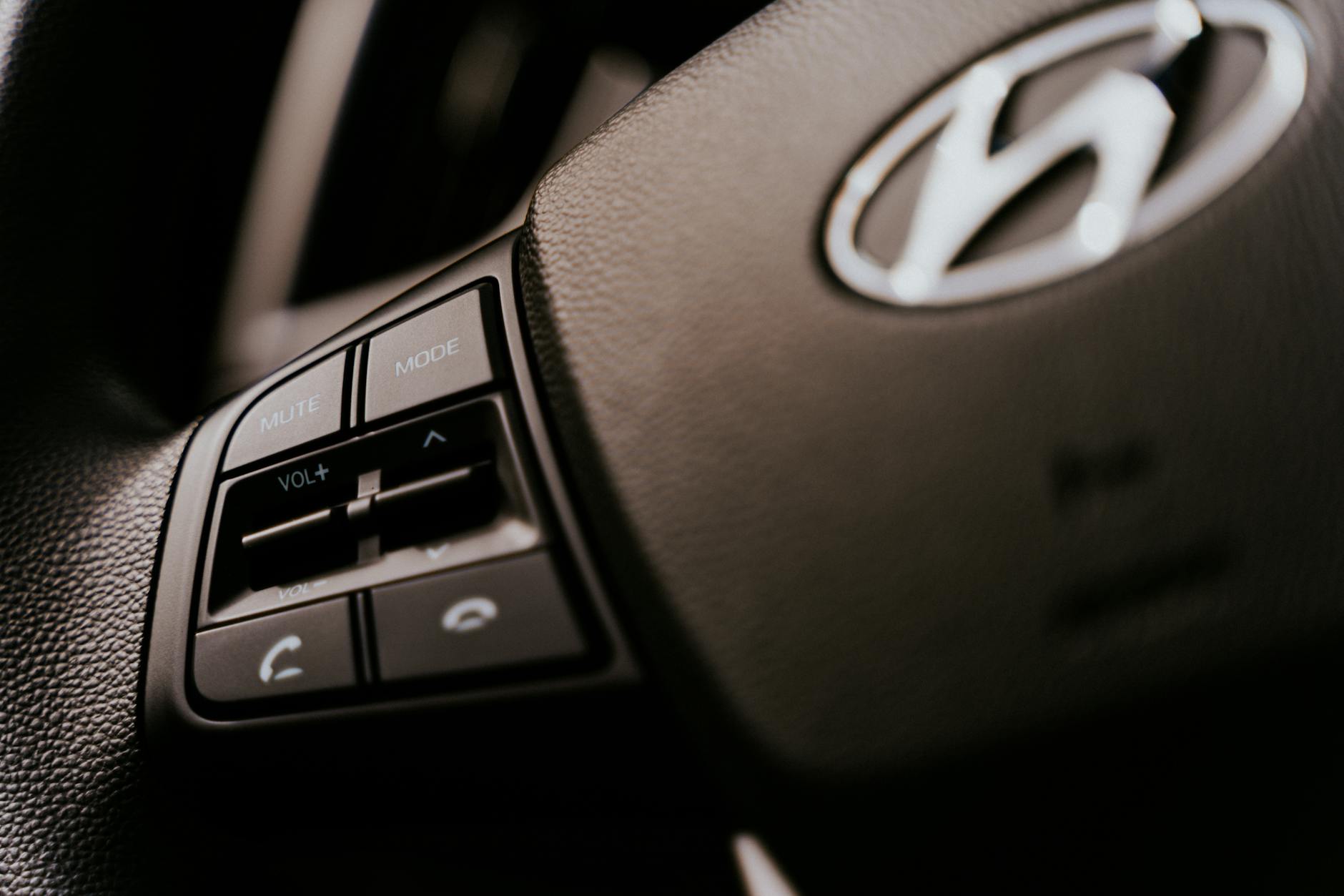 A Close-up Shot of Volume Controllers on a Dashboard