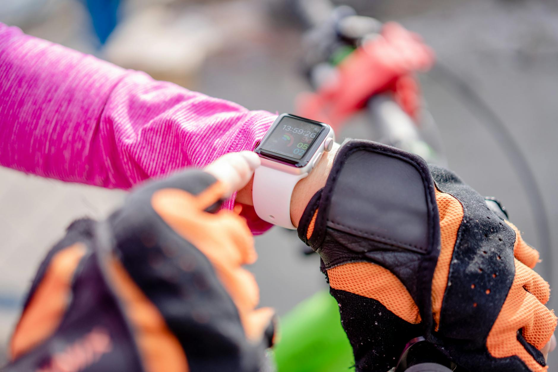 Person in Purple Shirt Wearing a Smartwatch