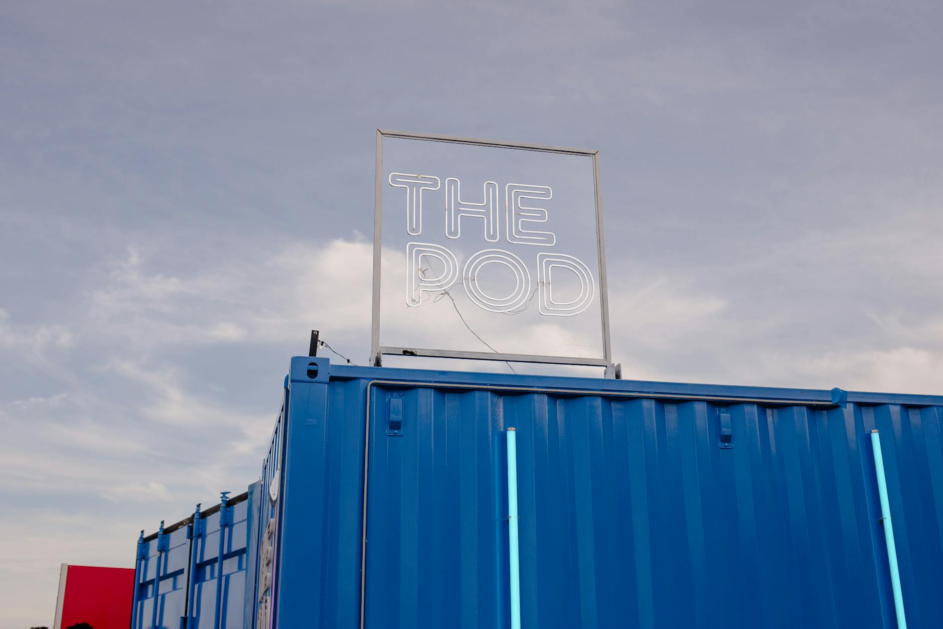 Sign over Metal Containers