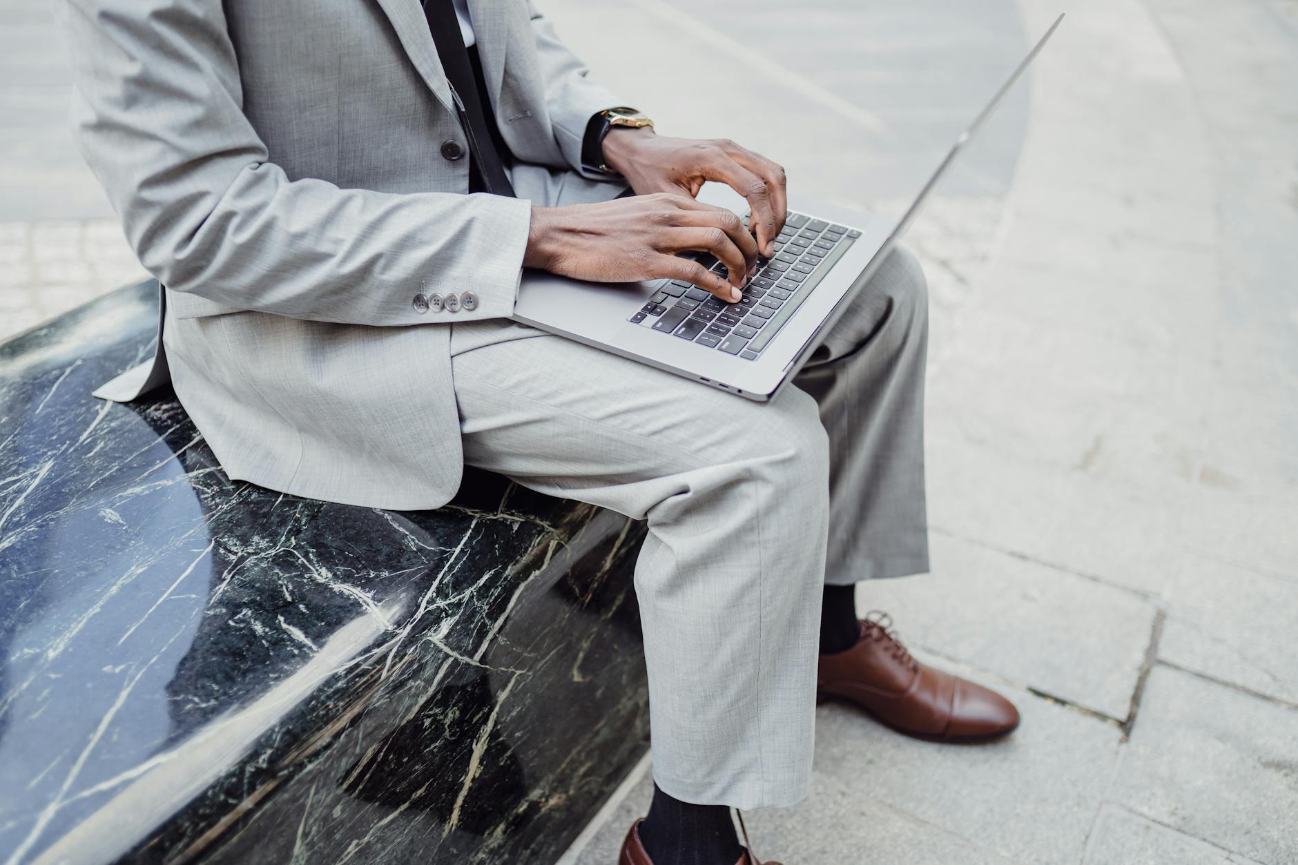 A Man Using a Laptop