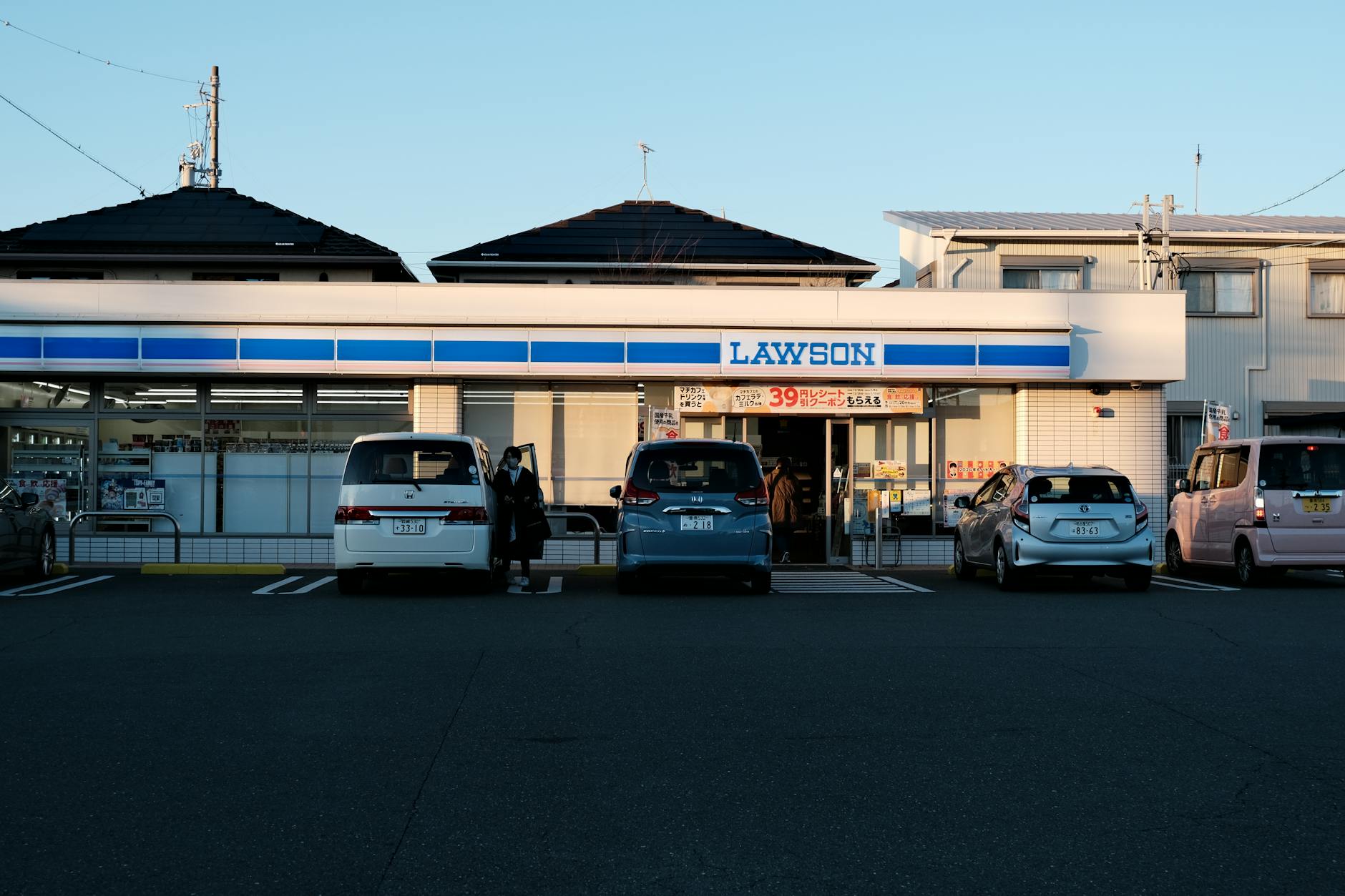 Cars in Front of a Grocery Store