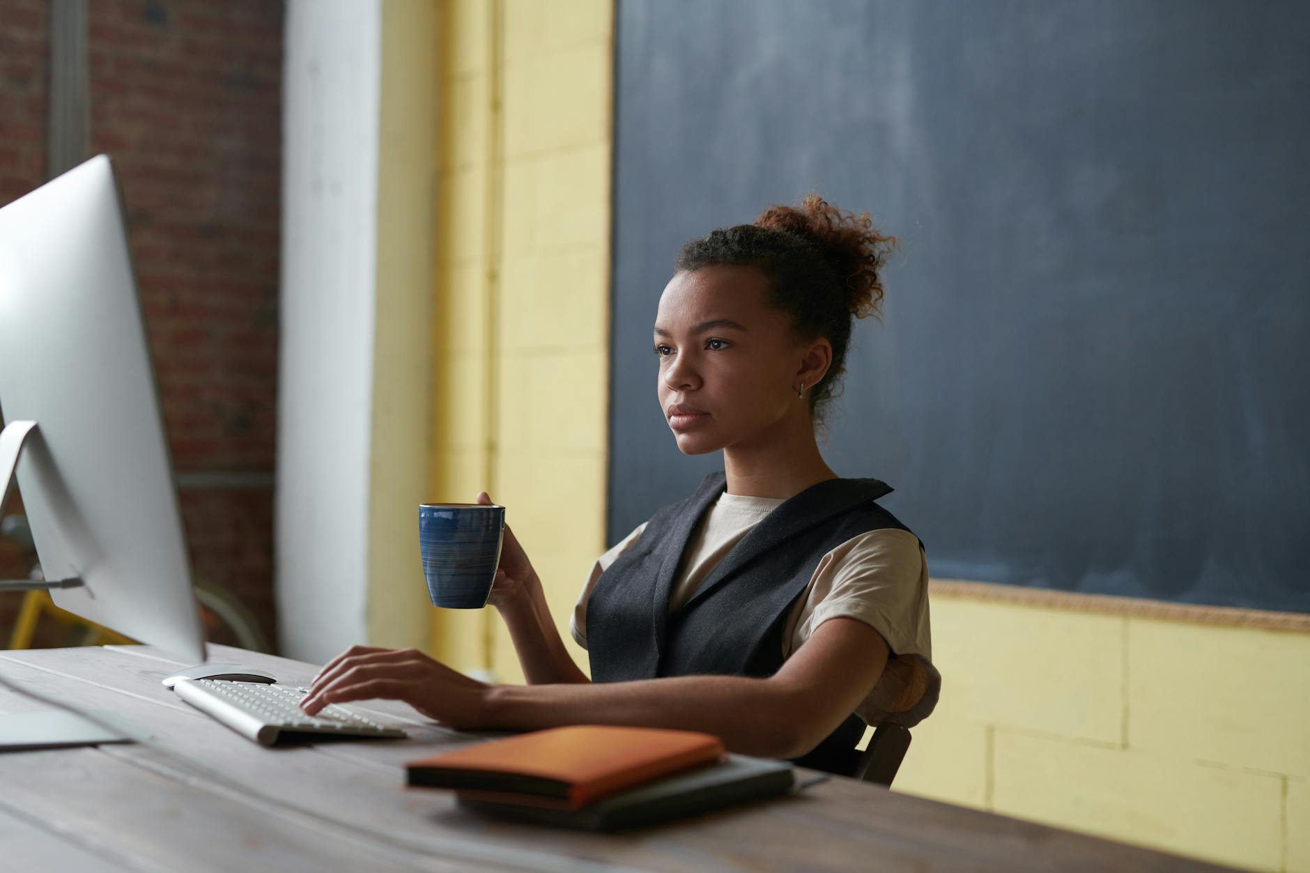 Woman holding her laptop