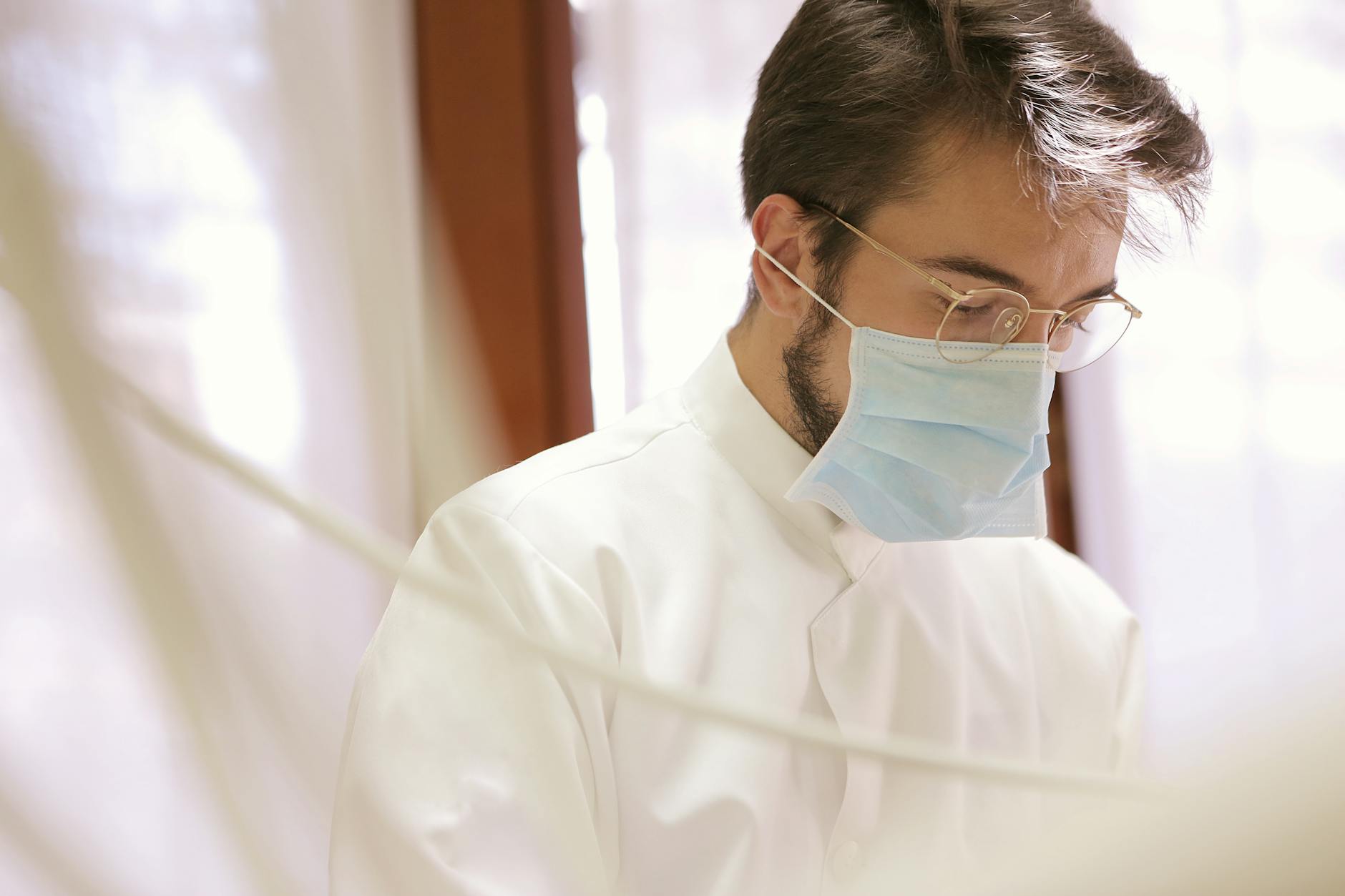 Man in White Shirt Wearing Eyeglasses