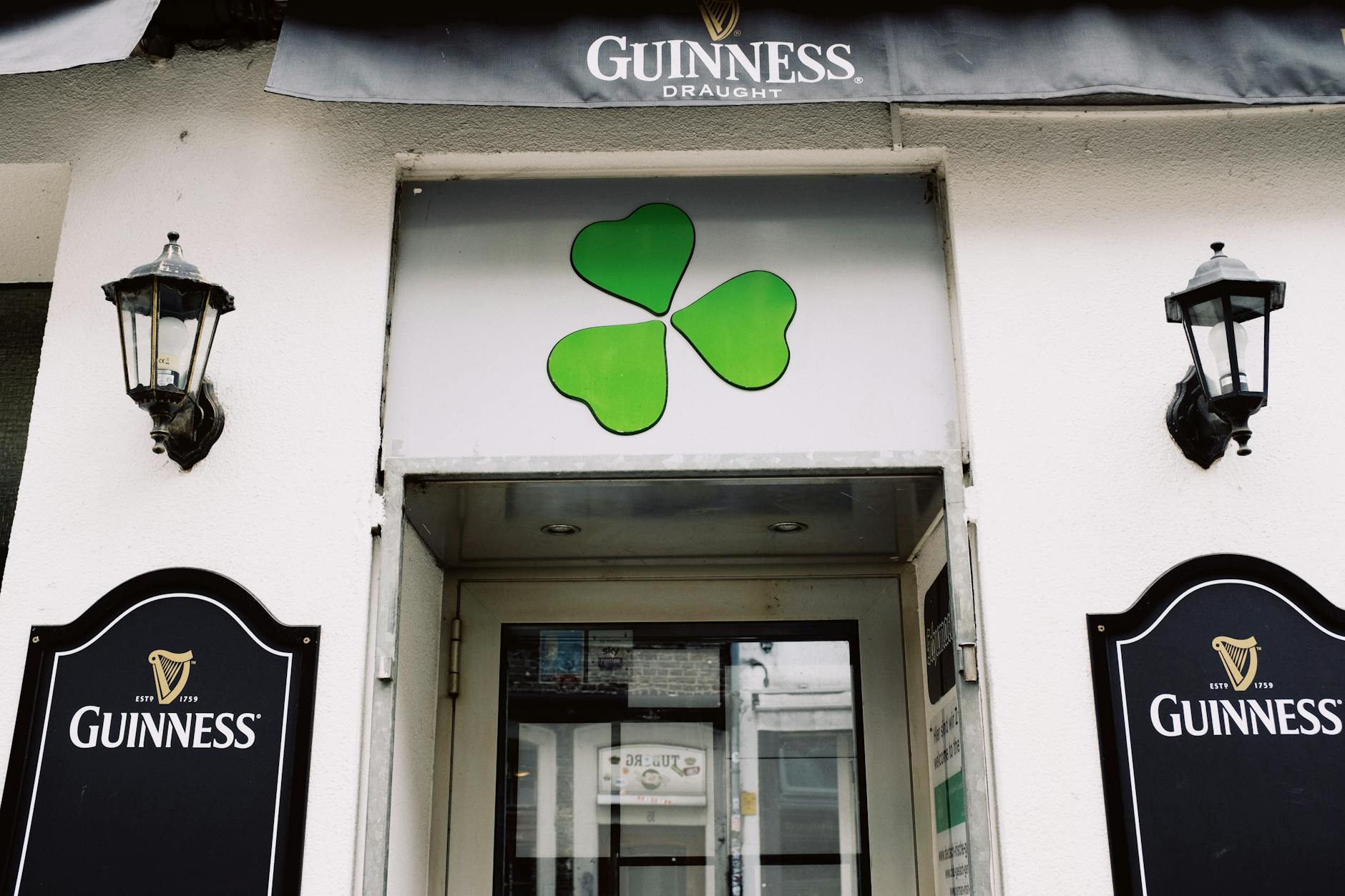 Frontage Of A Business Establishment With Logo On Wall