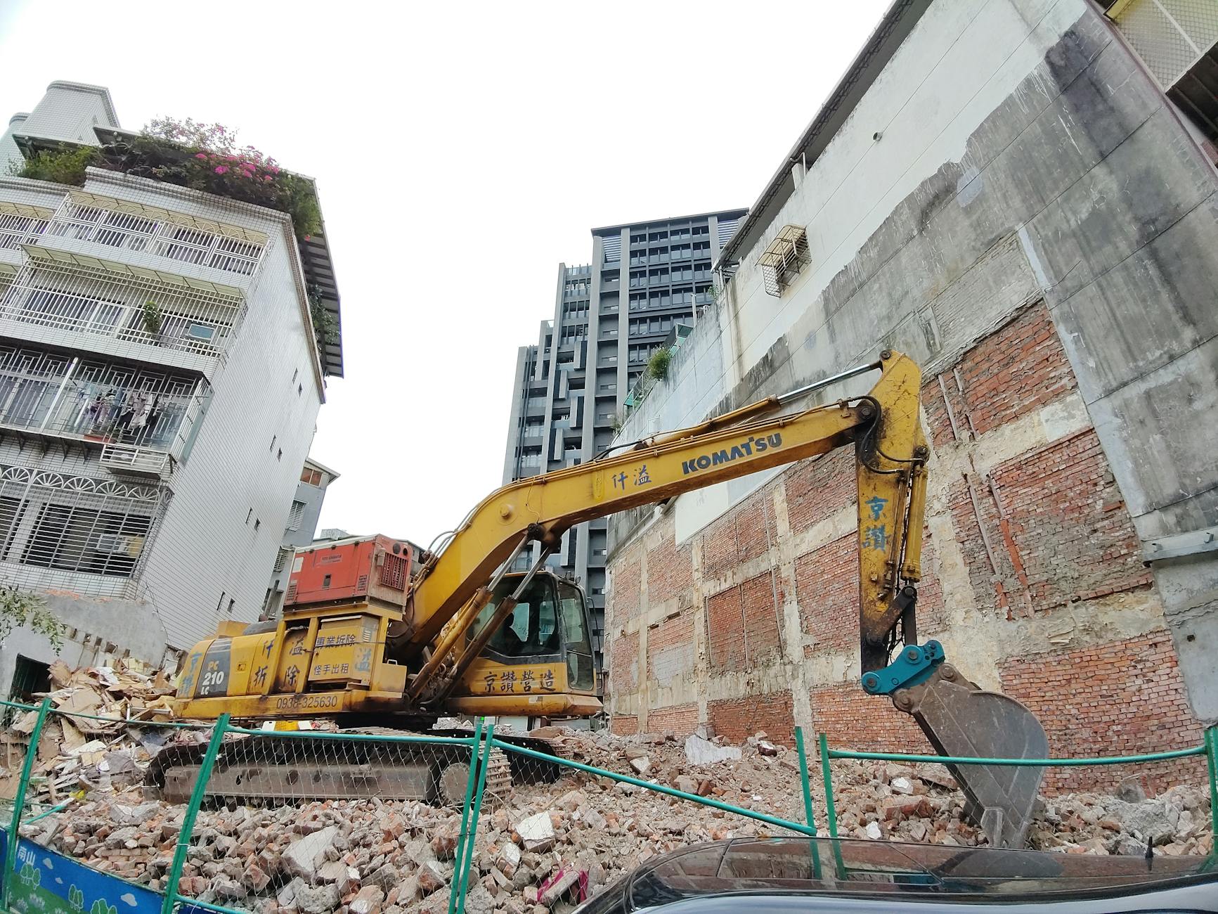 Excavator Near Building