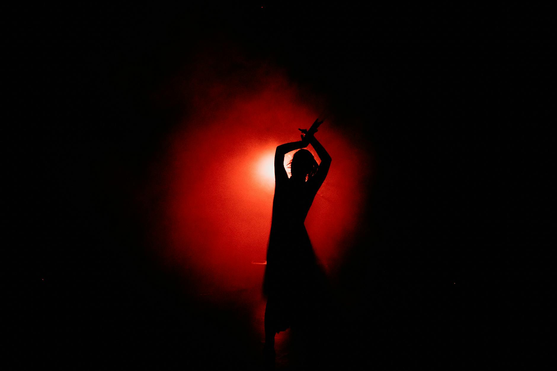 Silhouette of Person Dancing