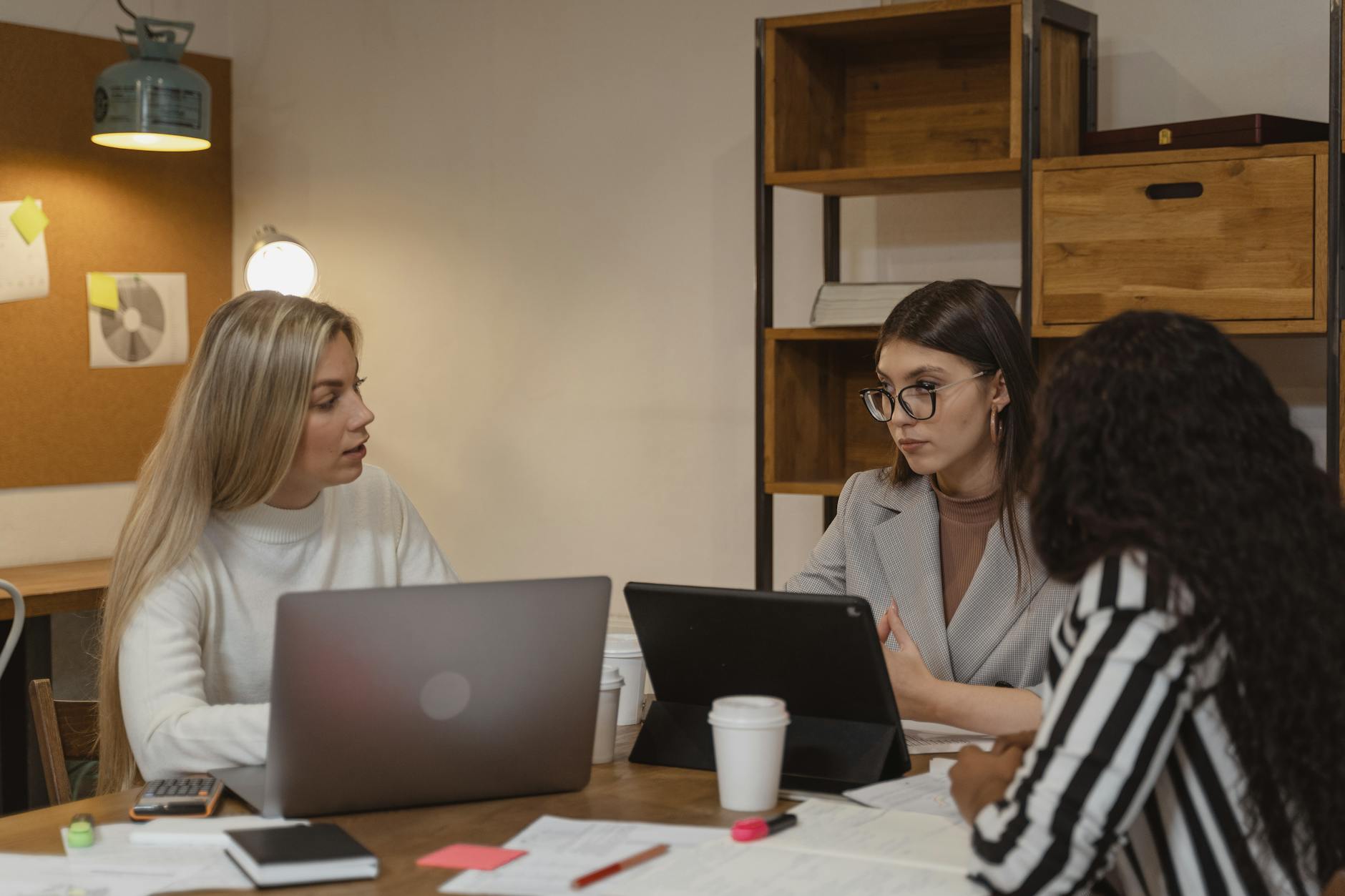 Women Having a Conversation With Laptop