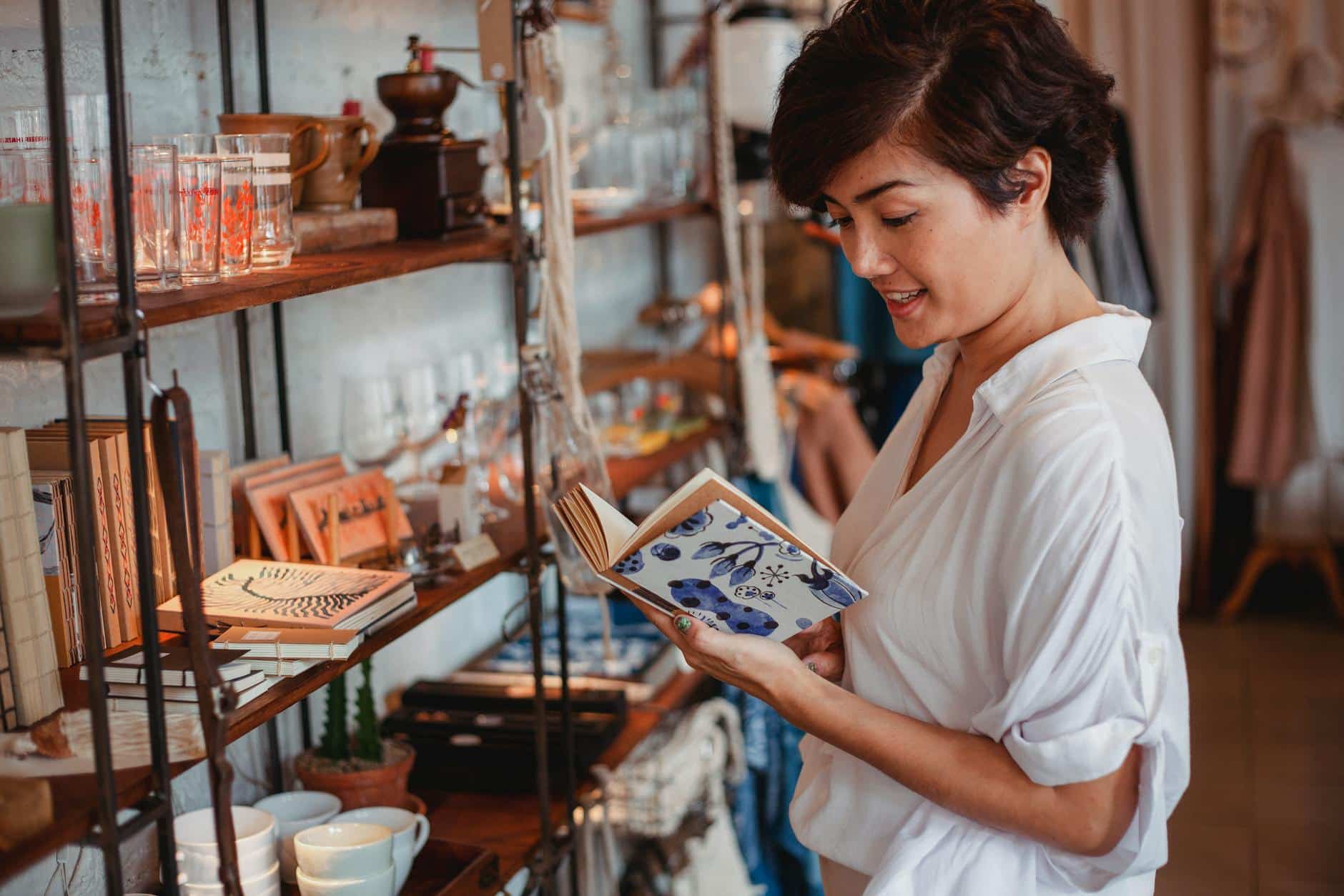 A young woman immersed in a book.