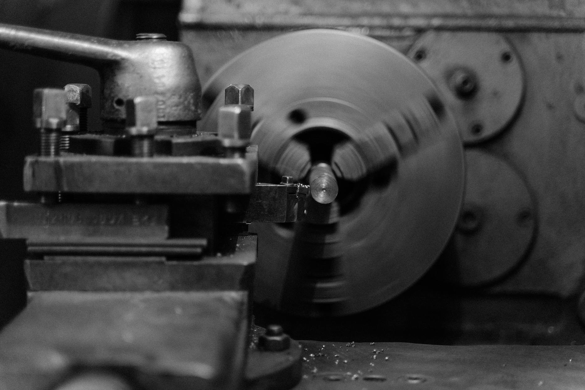 Grayscale Photo of a Lathe Machine