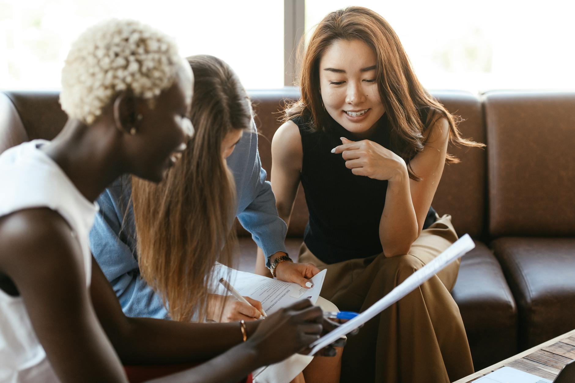 Group of multiethnic colleagues discussing business strategies