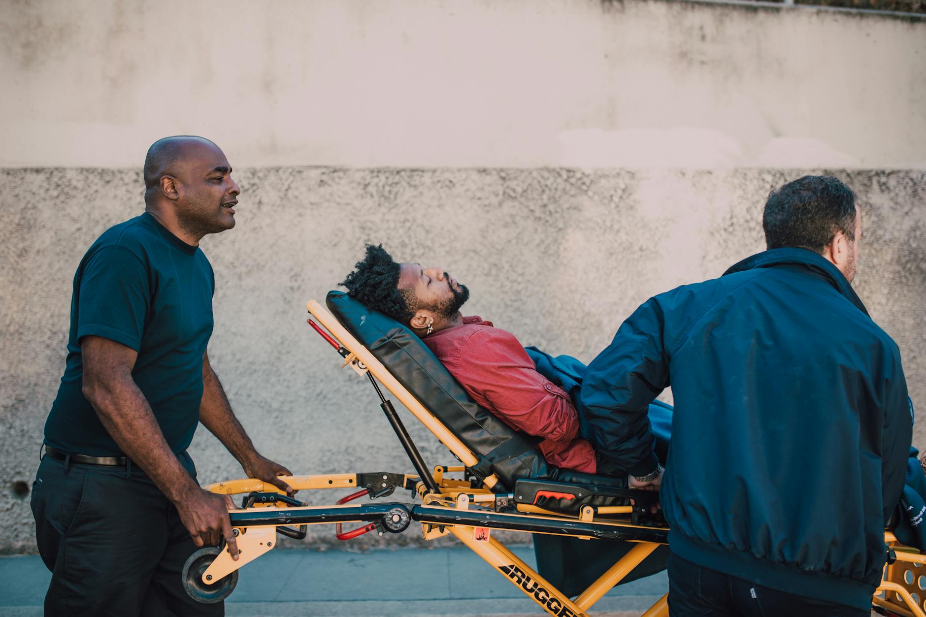 Doctors using a stretcher