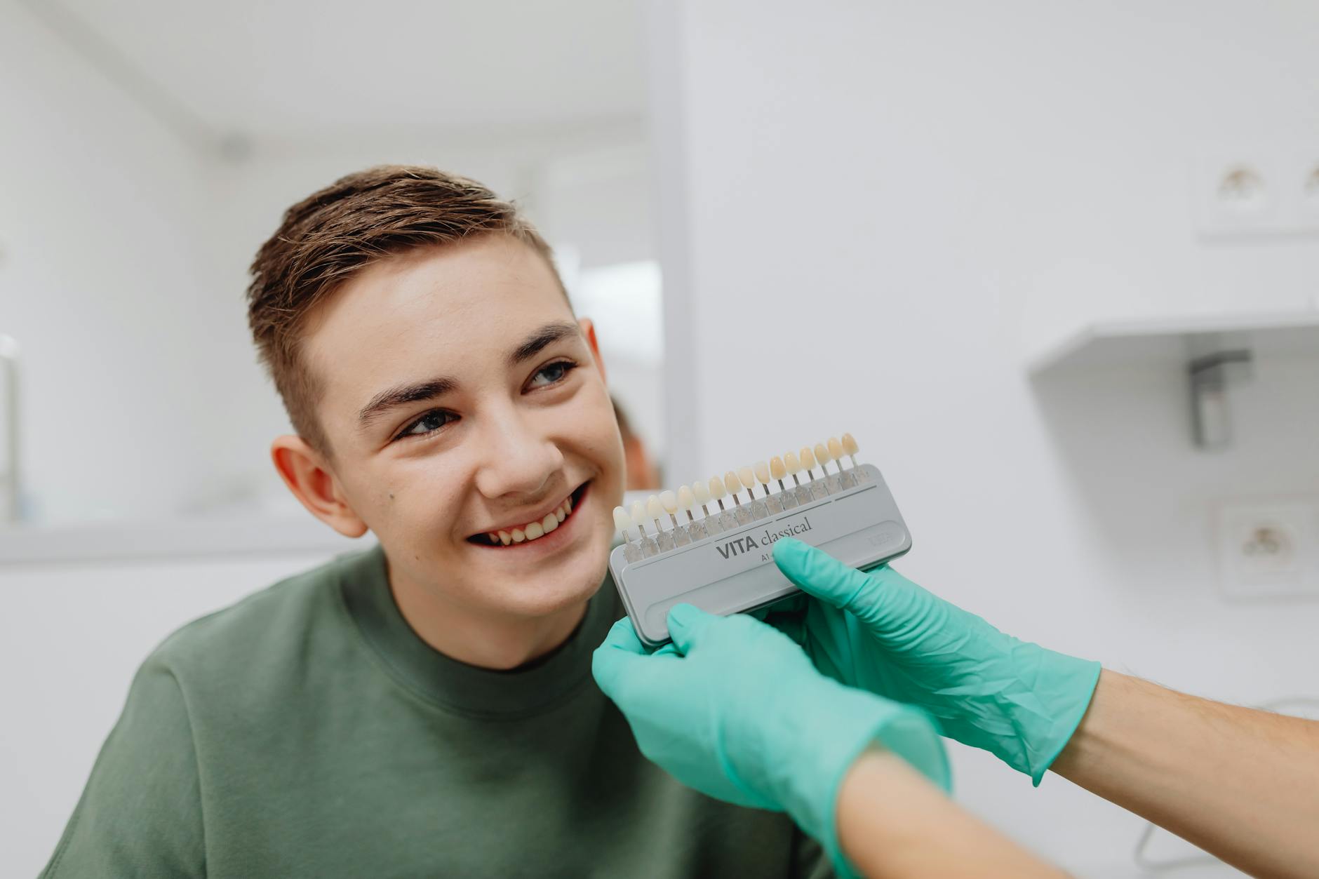 A Person Smiling While Holding a Medical Clipboard