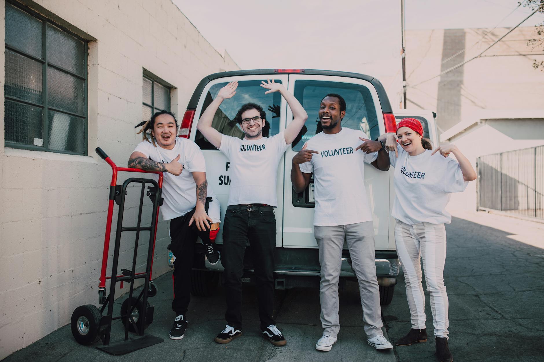 A Group of Volunteers Wearing White Shirts