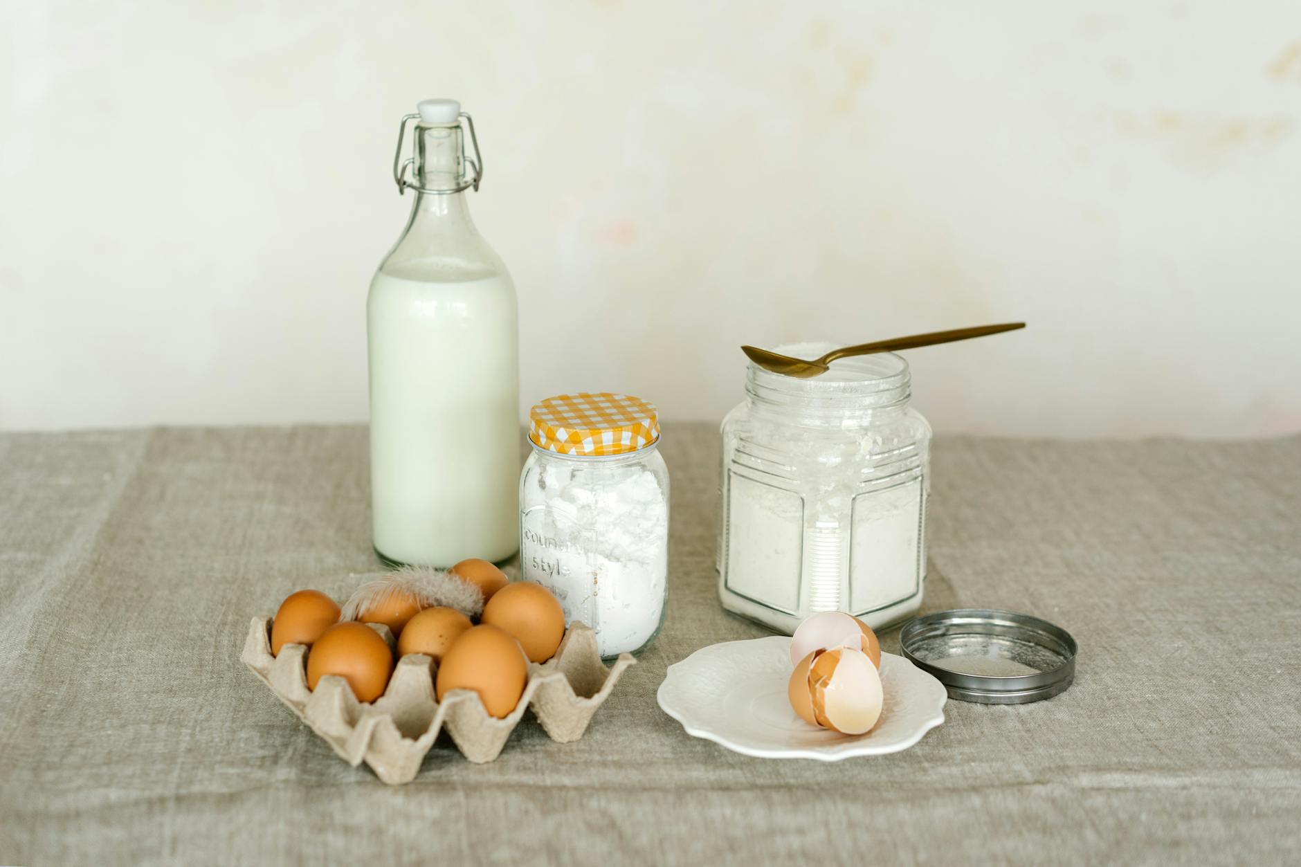 Baking Ingredients in Containers on a Table