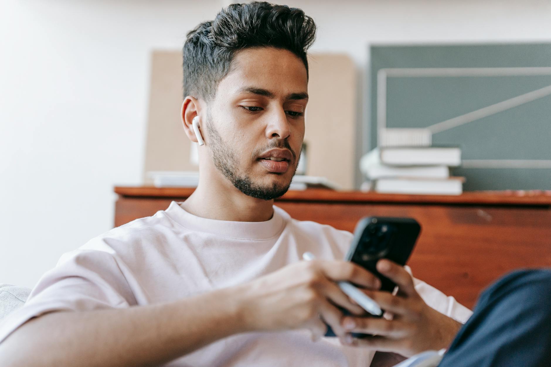 A person enjoying music on a smartphone