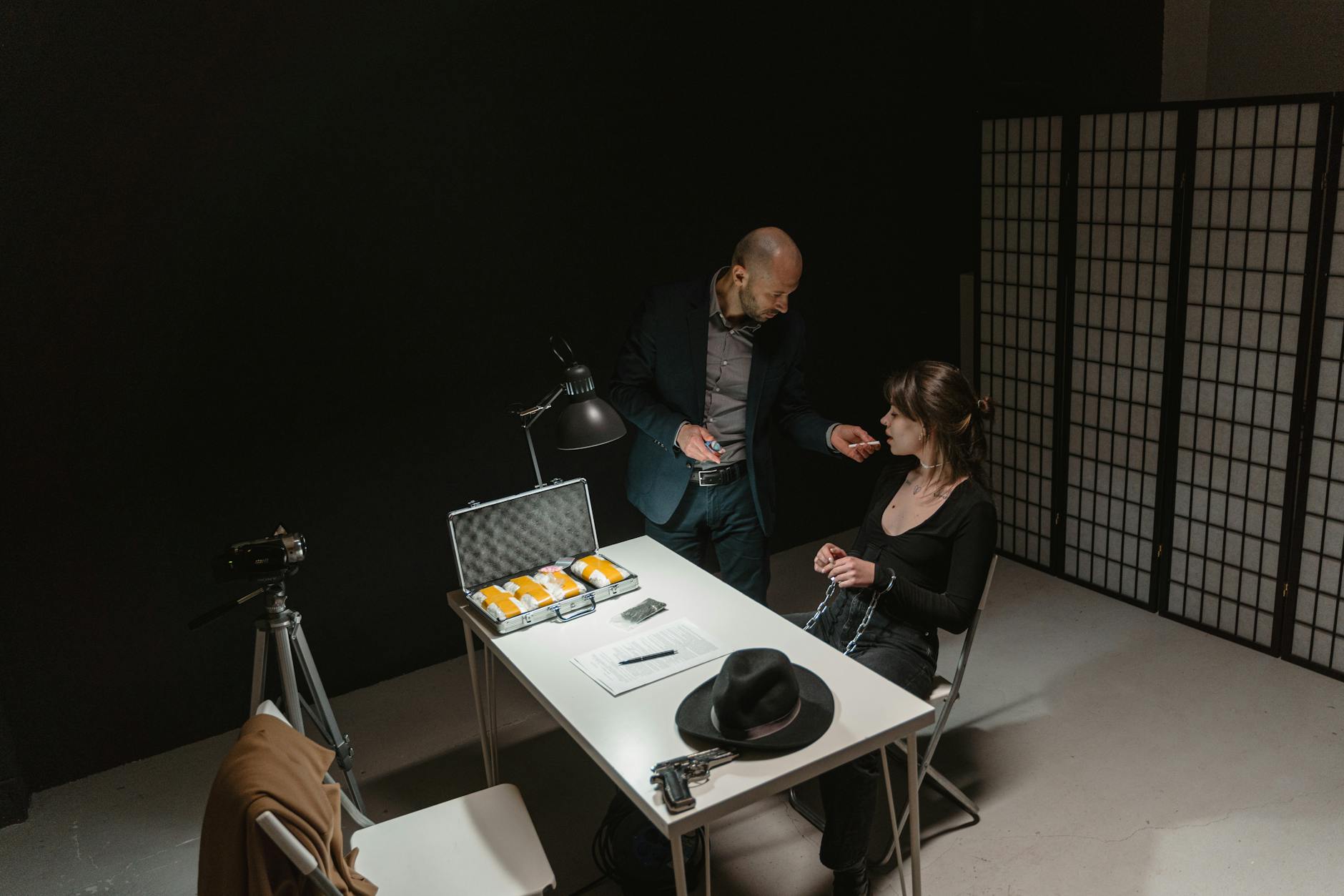 man-and-woman-sitting-by-table