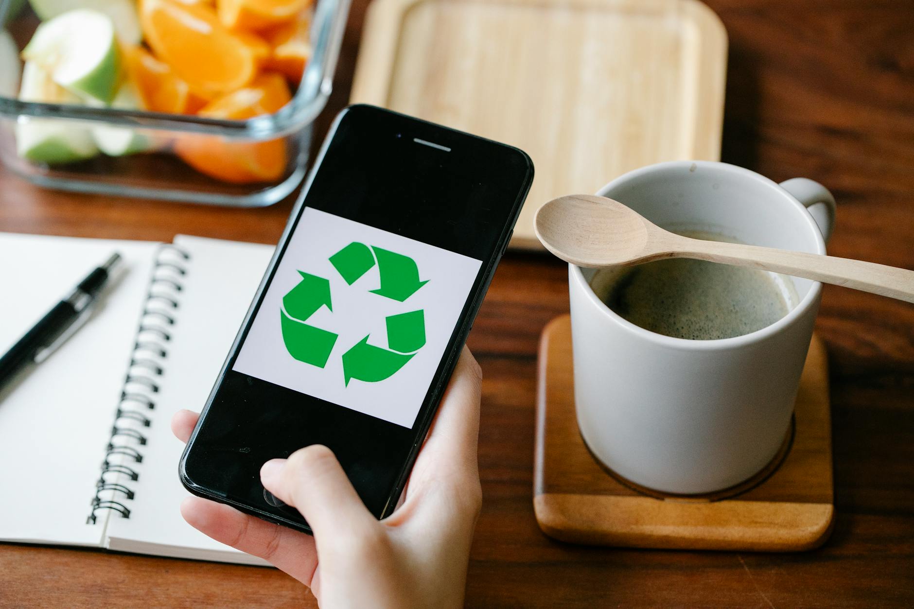 A person using an app to track recycling