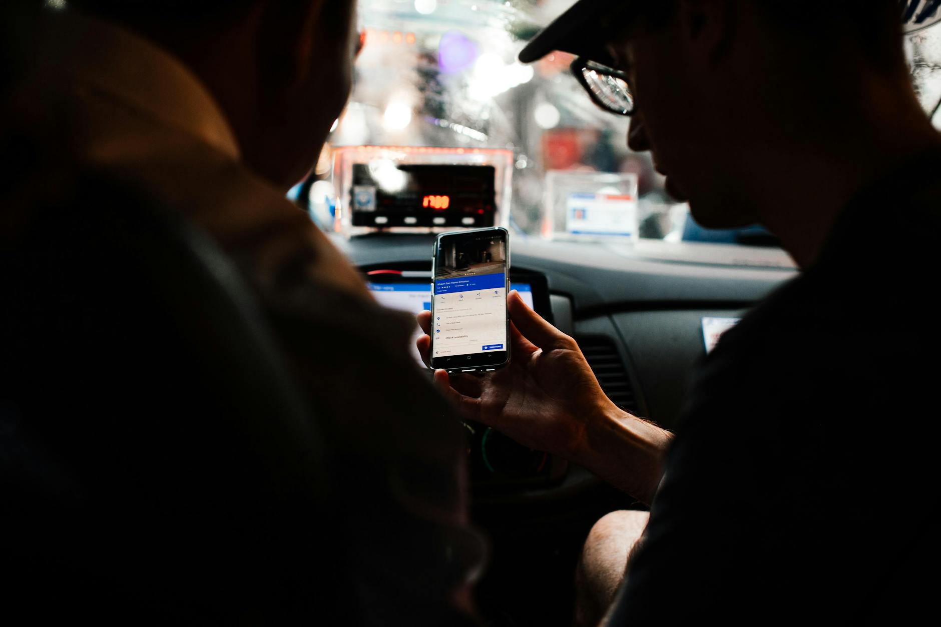 A person using a digital tablet for road maintenance