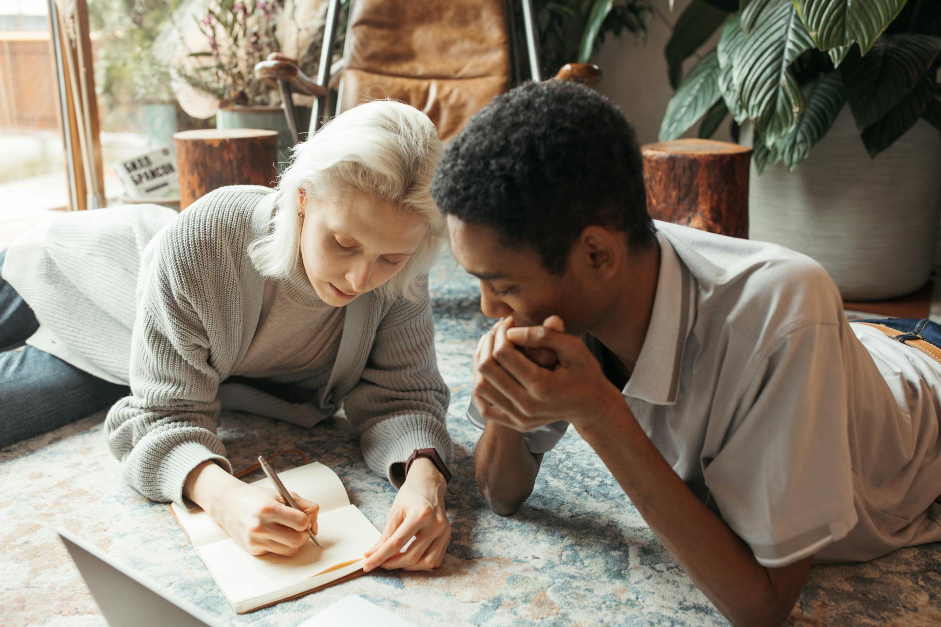 Man in a White Dress Shirt Sitting Beside Woman