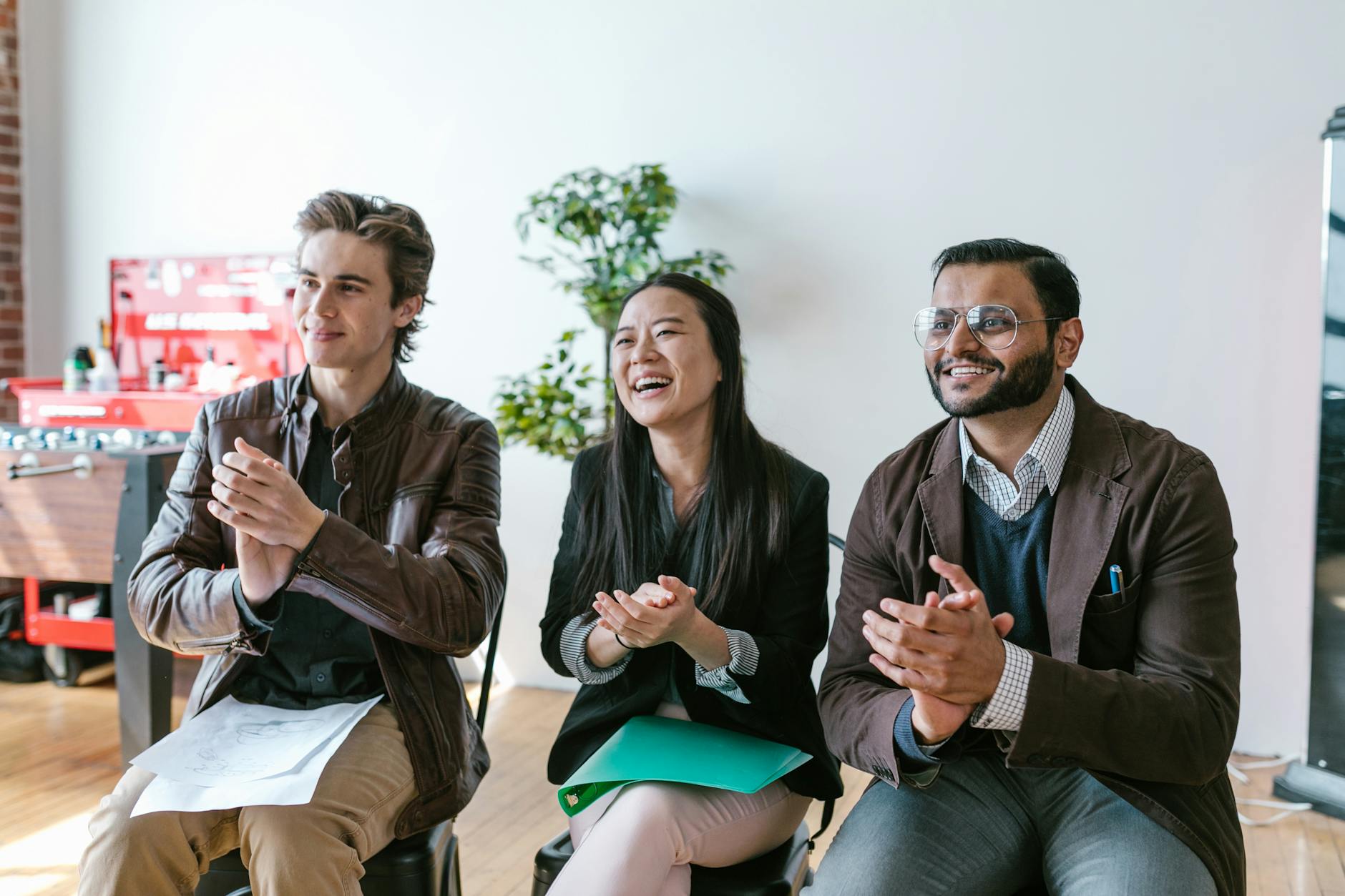 Image of a diverse business team working in an office