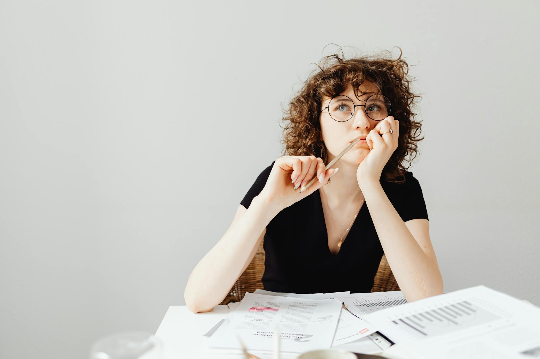 Woman with Curly Hair Thinking